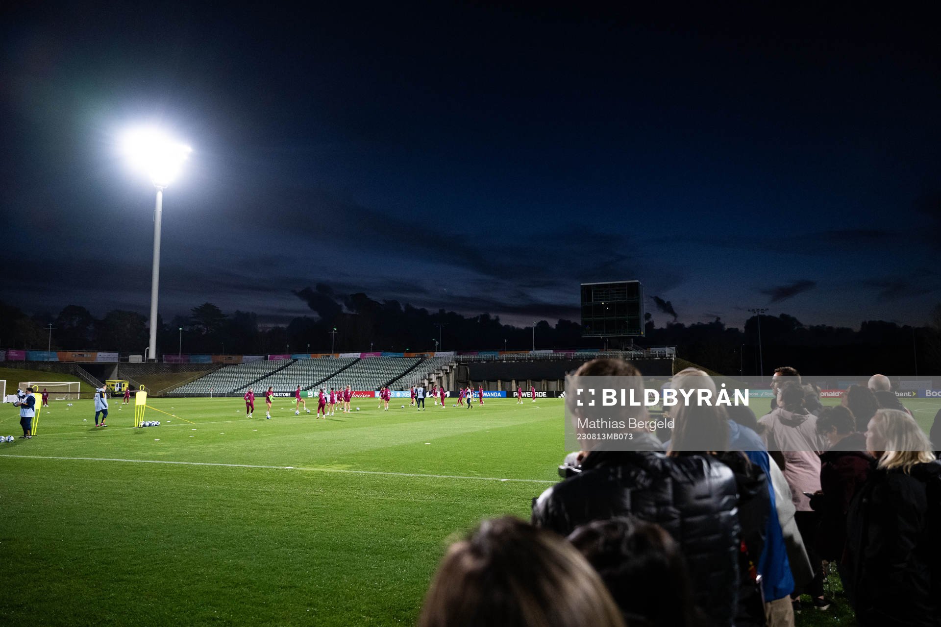 Journalists watch players of the Spanish women's national football team at a training session during the FIFA Women's World Cup on August 13, 2023 in Auckland.
