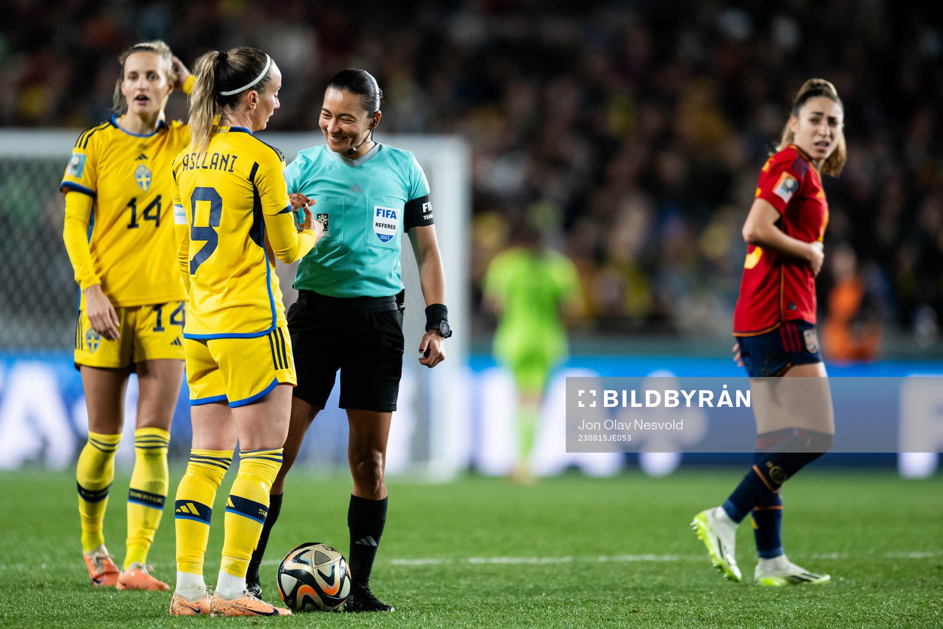 Kosovare Asllani of Sweden and referee Edina Alves
