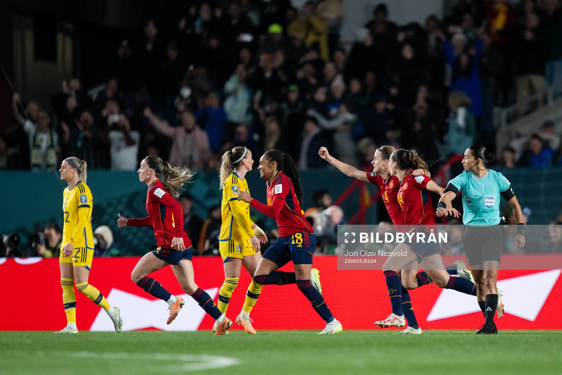 Players of Spain celebrate