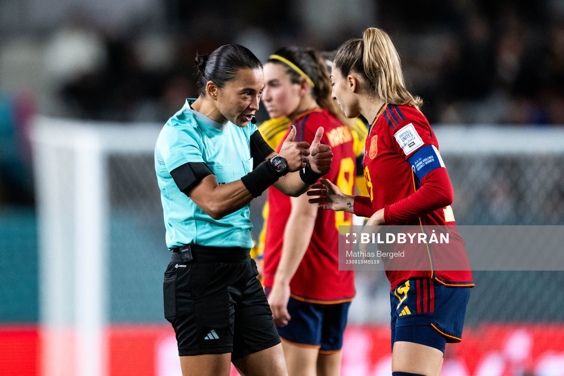 Referee Edina Alves and Olga Carmona of Spain