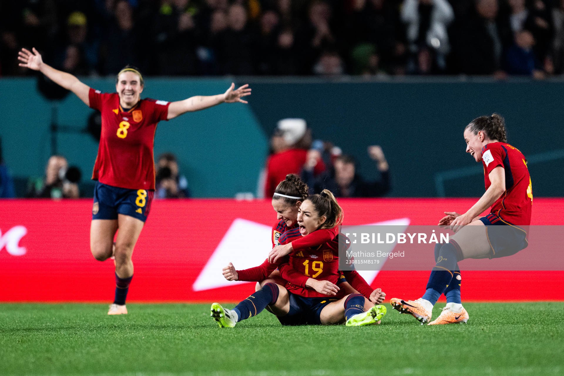 Olga Carmona of Spain celebrates with team mates