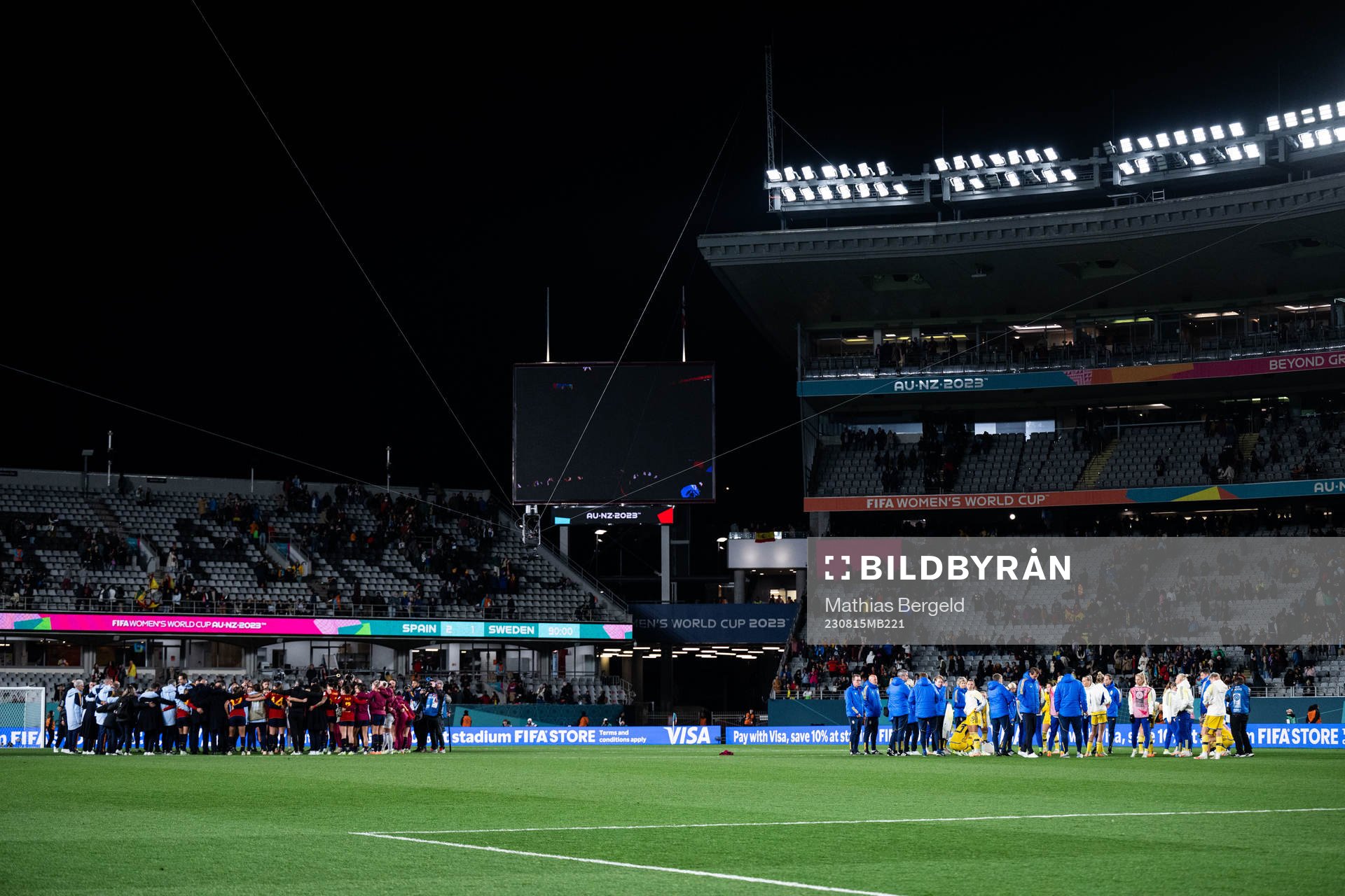 Players of Spain and of Sweden gather