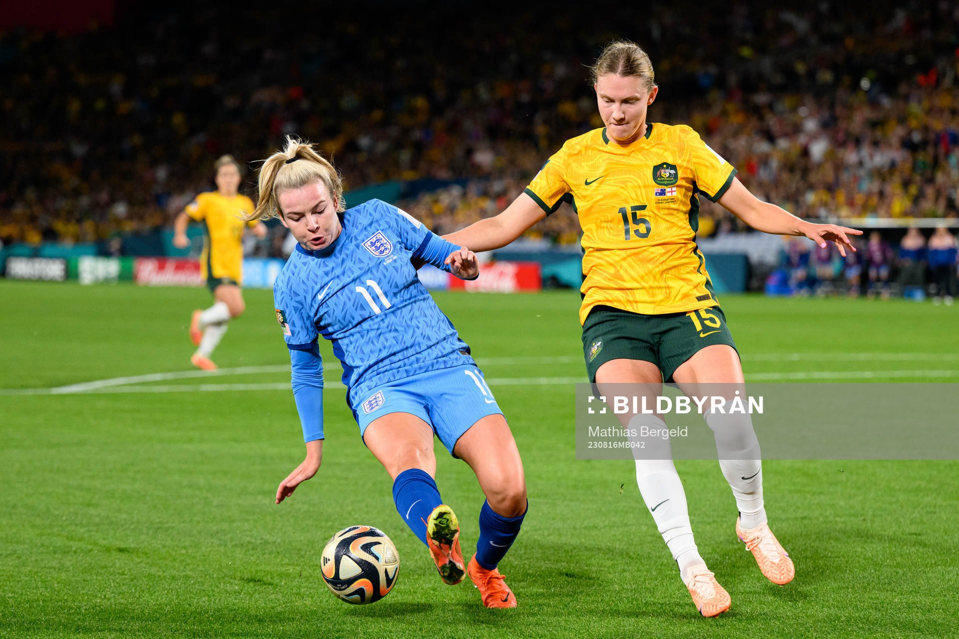 Lauren Hemp of England and Clare Hunt of Australia