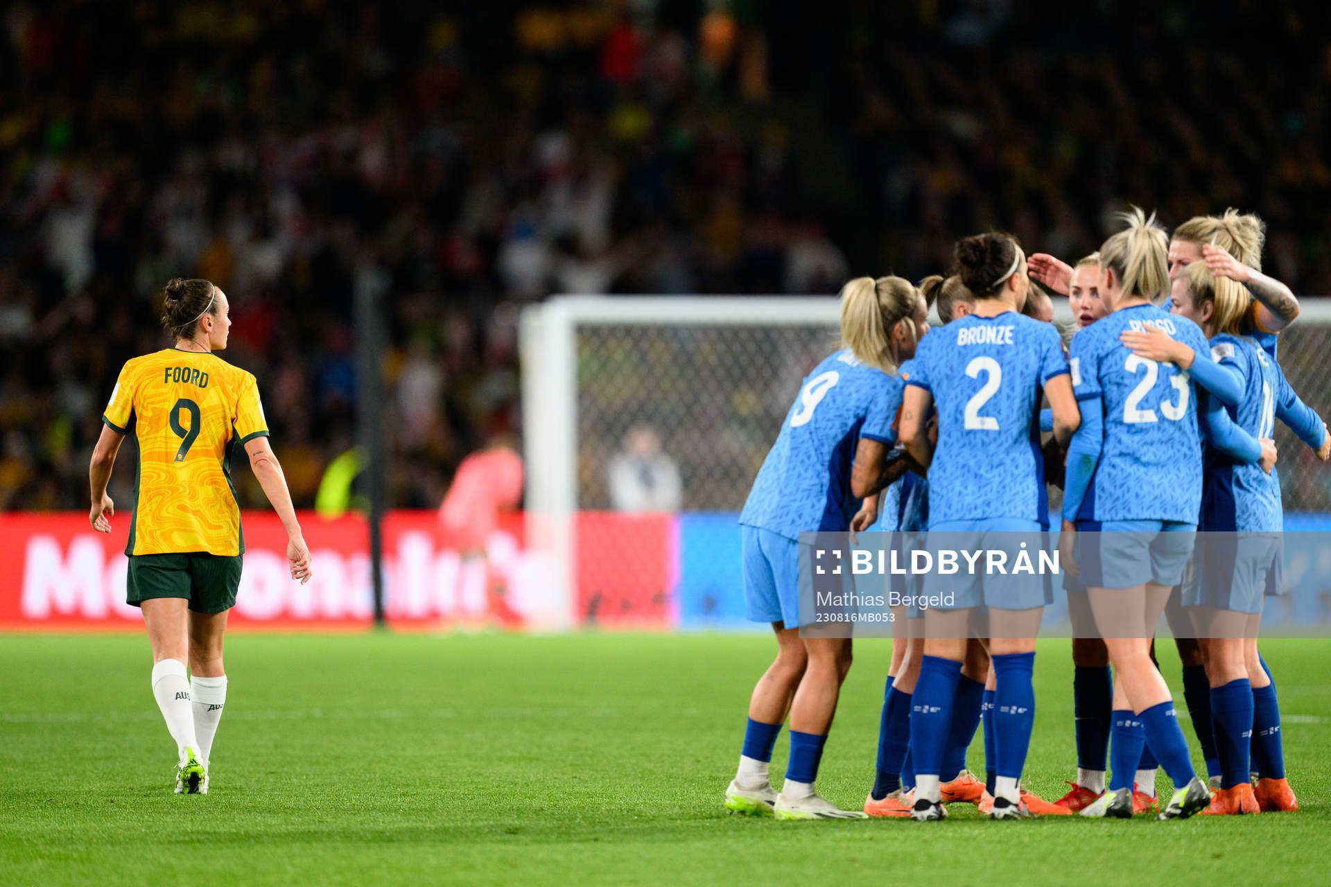 Caitlin Foord of Australia looks dejected as the players of