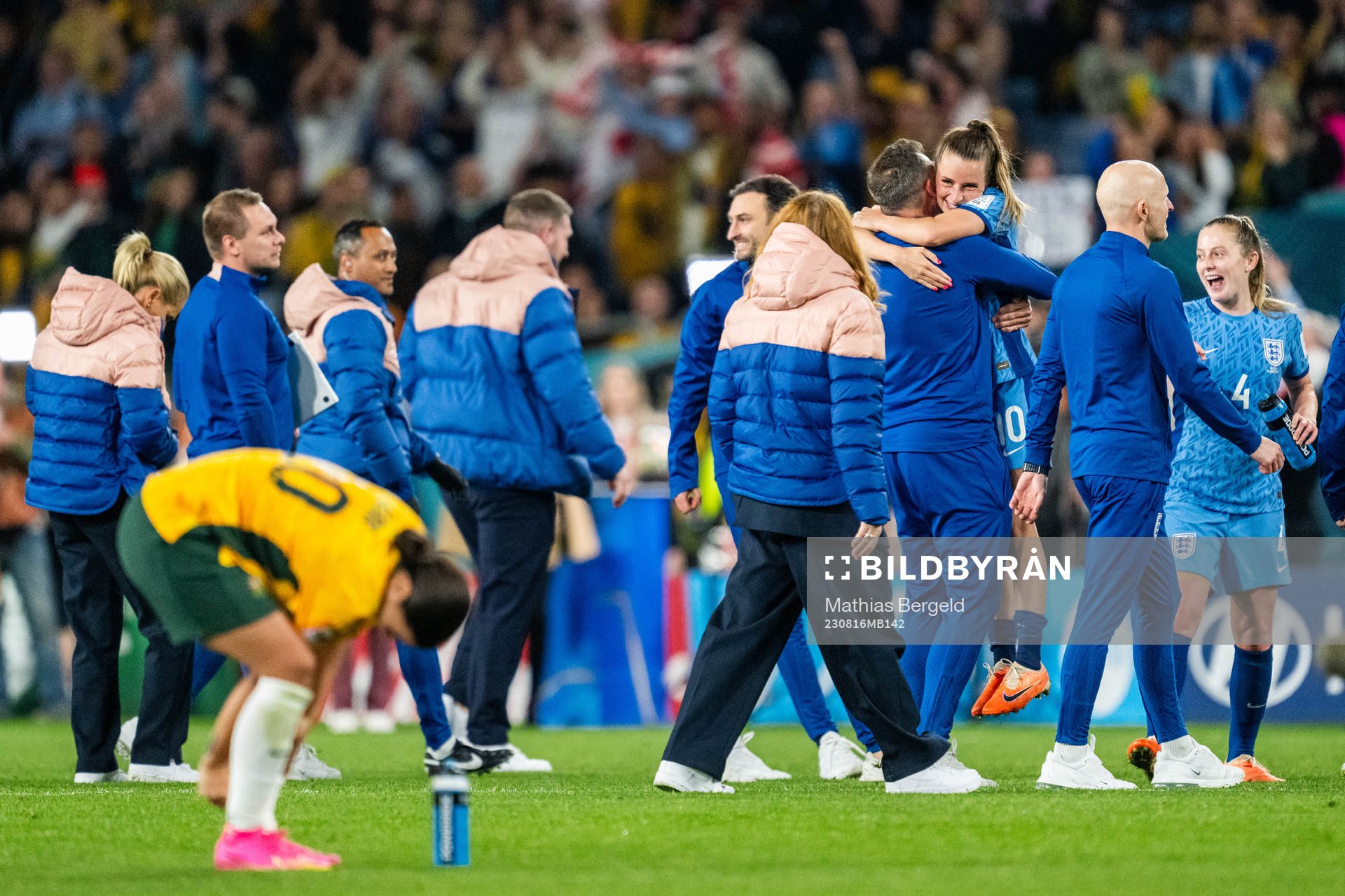 Ella Toone of England celebrates with staff after the FIFA Women's World Cup semifinal between Australia and England on August 16, 2023 in Sydney.