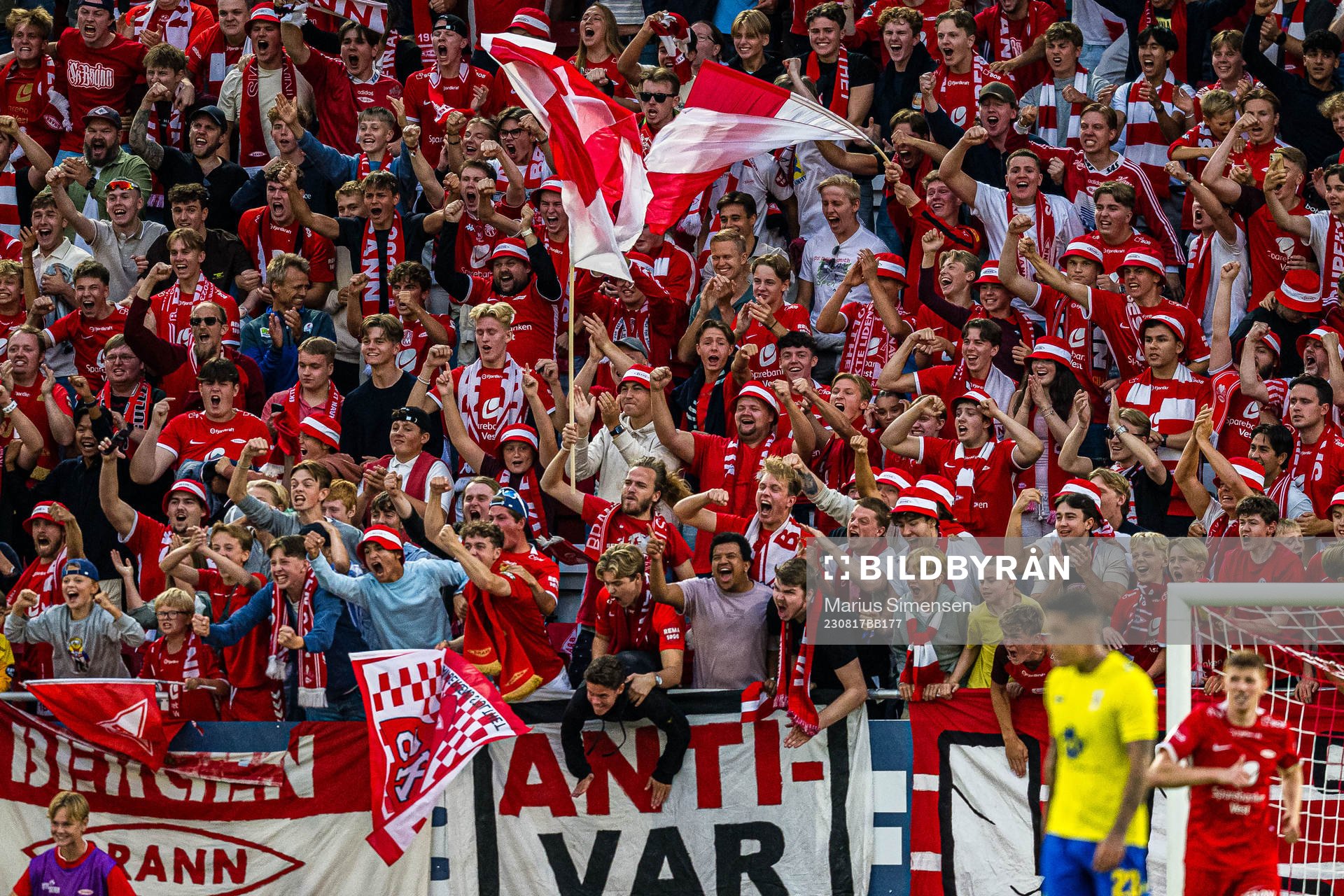 Spectators in the stands celebrates at the final whistle