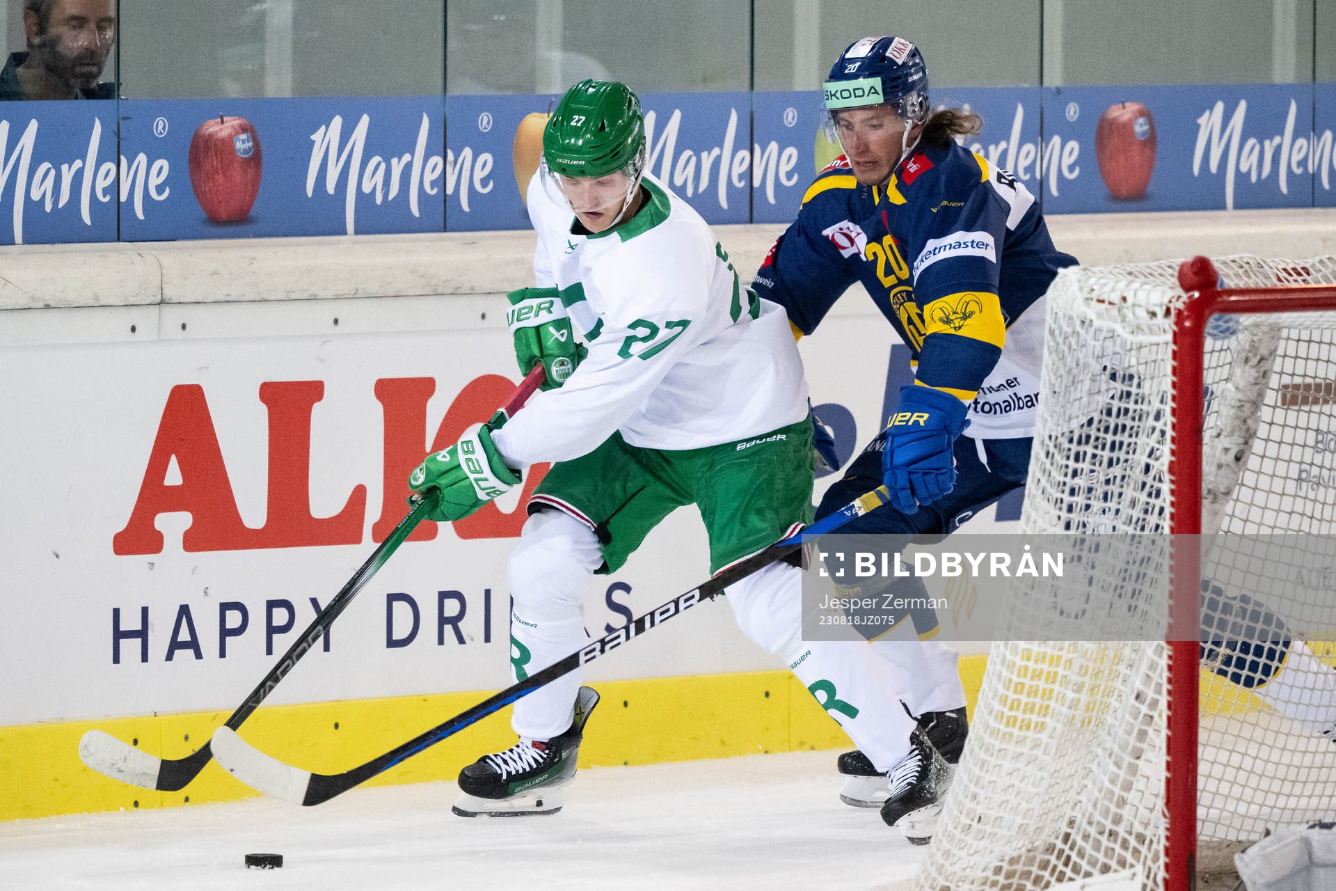 Linus Sjödin of Rögle and Michael Fora of Davos