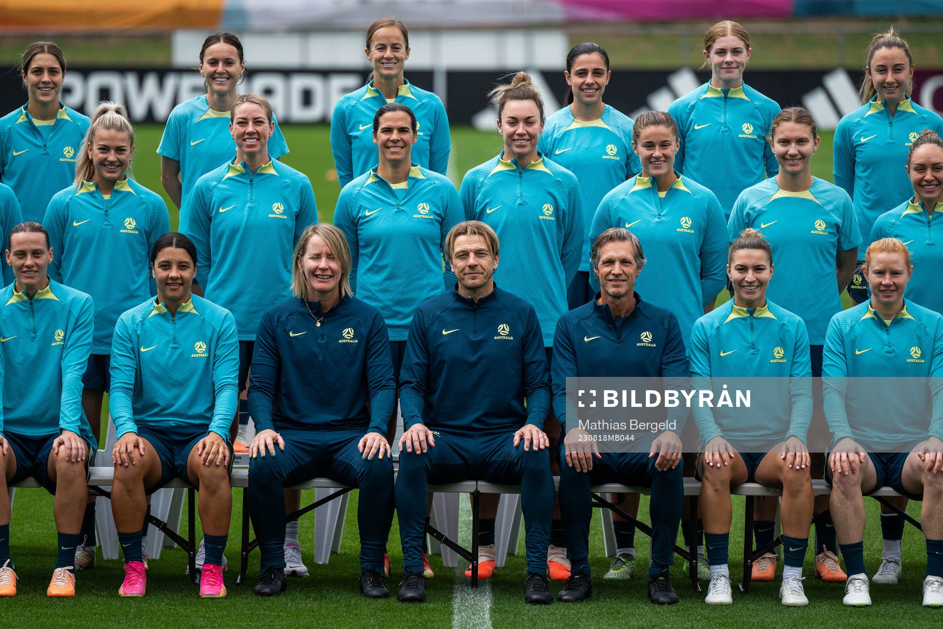 Head coach Tony Gustavsson, assistant coach Jens Fjellström and players of the Australian women's national football team pose for a picture at a training session during the FIFA Women's World Cup on August 18, 2023 in Brisbane.