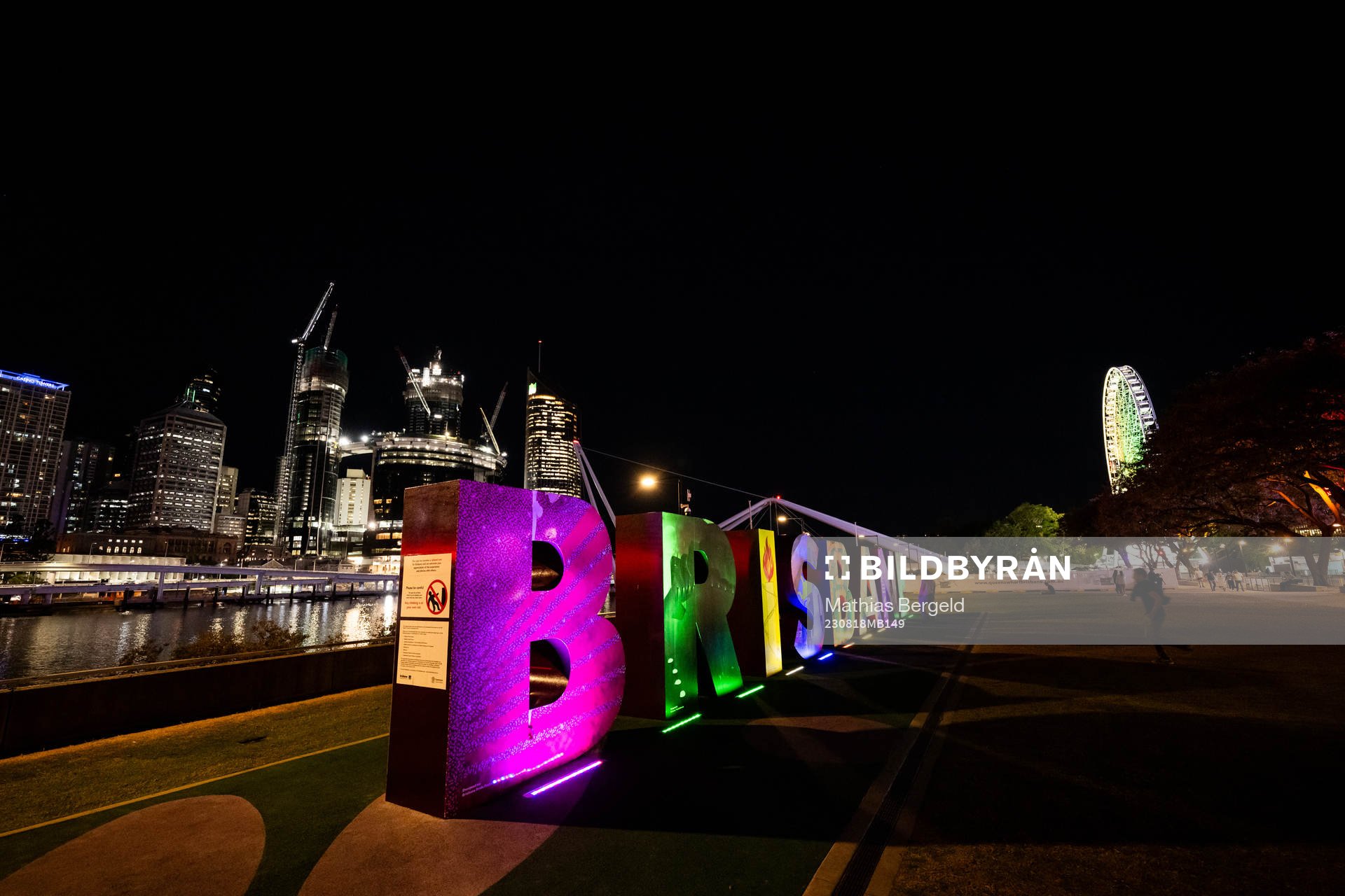 Lit up letters that read ”Brisbane”  is seen in front