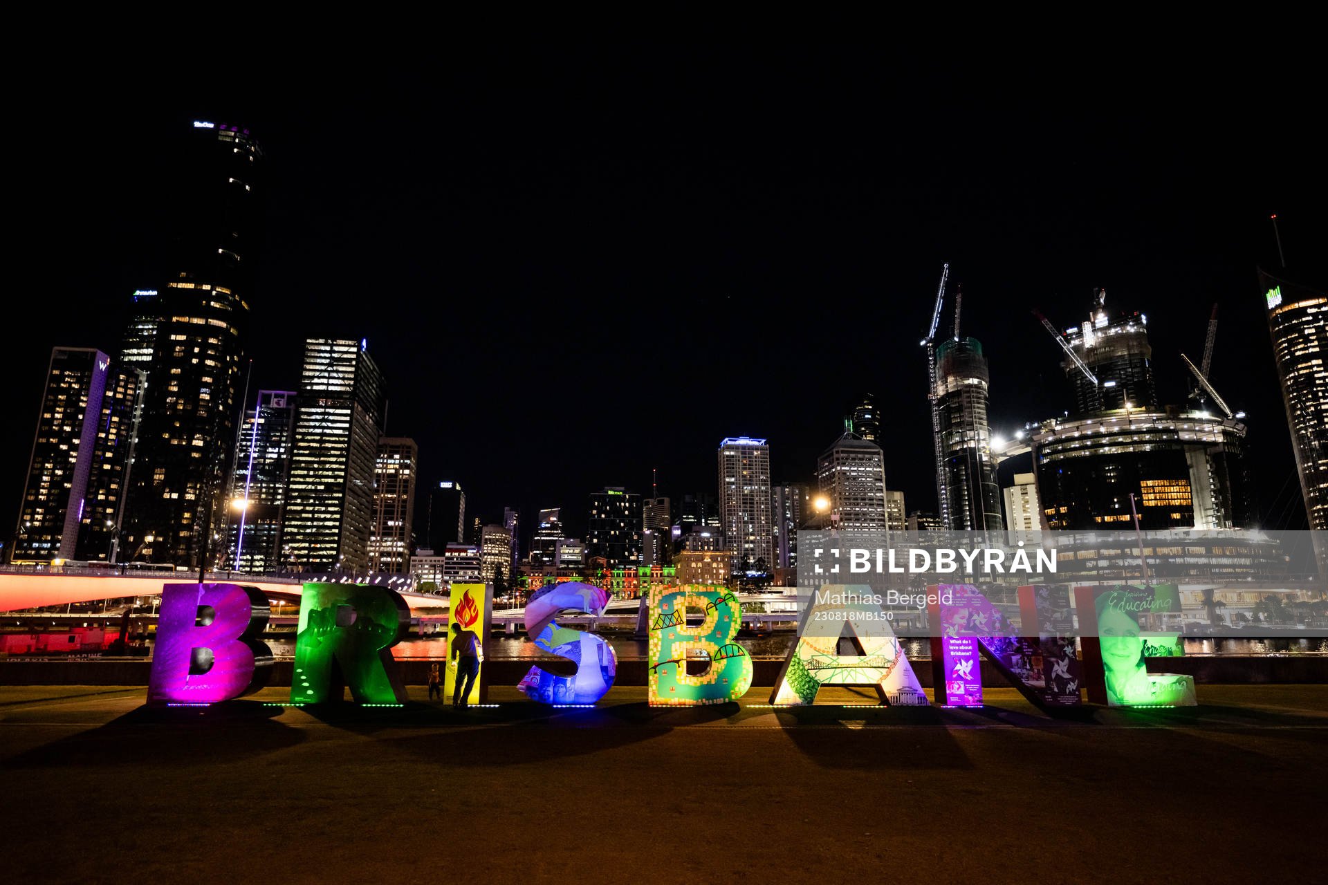Lit up letters that read ”Brisbane”  is seen in front
