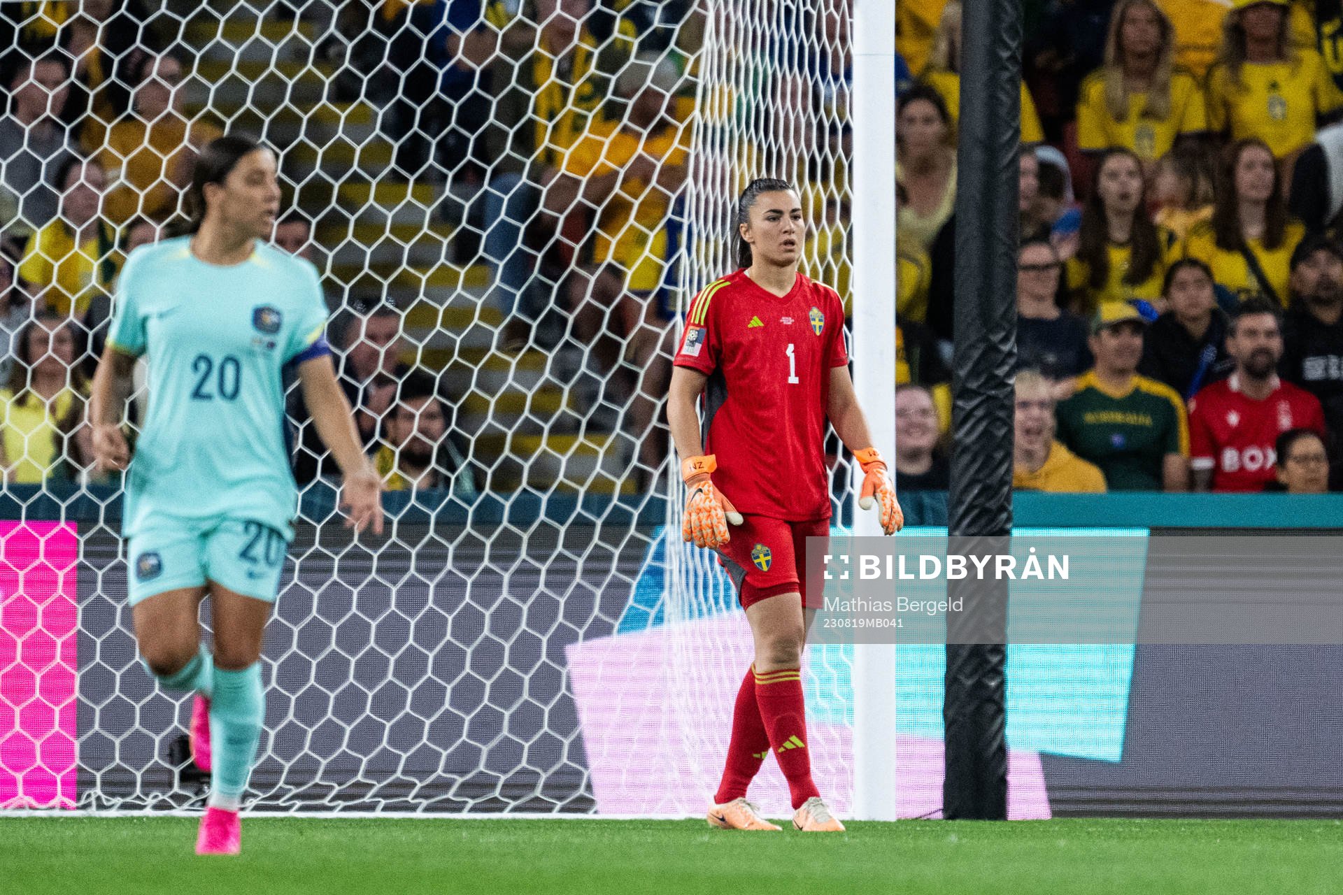 Sam Kerr of Australia and  goalkeeper Zecira Musovic of