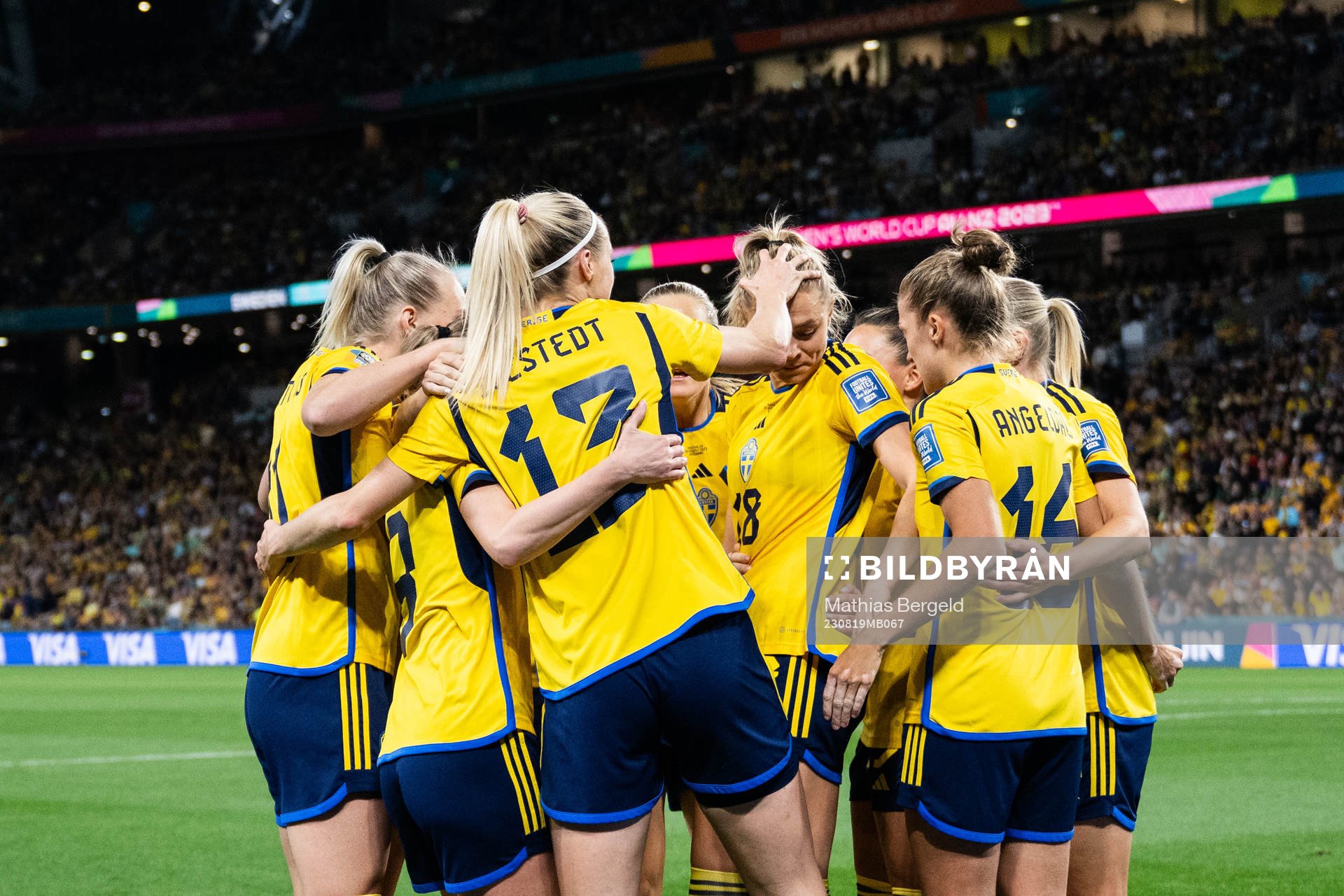 Fridolina Rolfö of Sweden celebrates with team mates