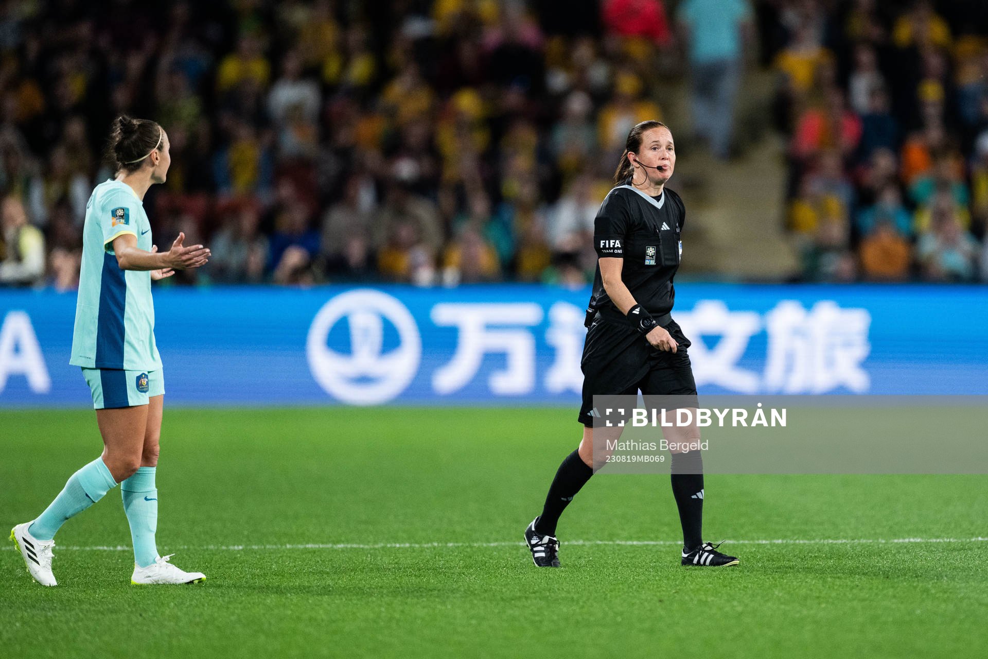 Caitlin Foord of Australia reacts to referee Cheryl Foster