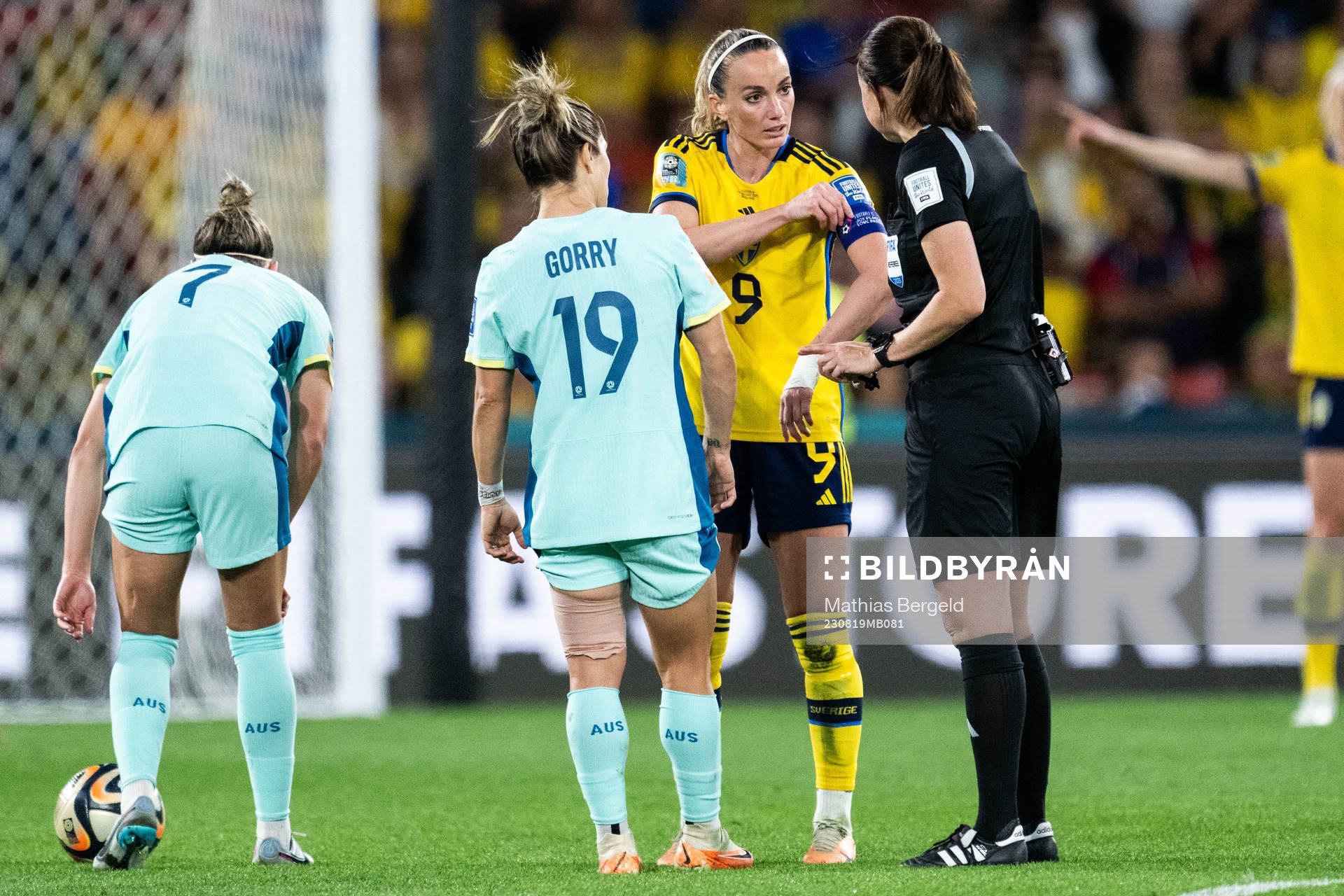 Katrina Gorry of Australia, Kosovare Asllani of Sweden and