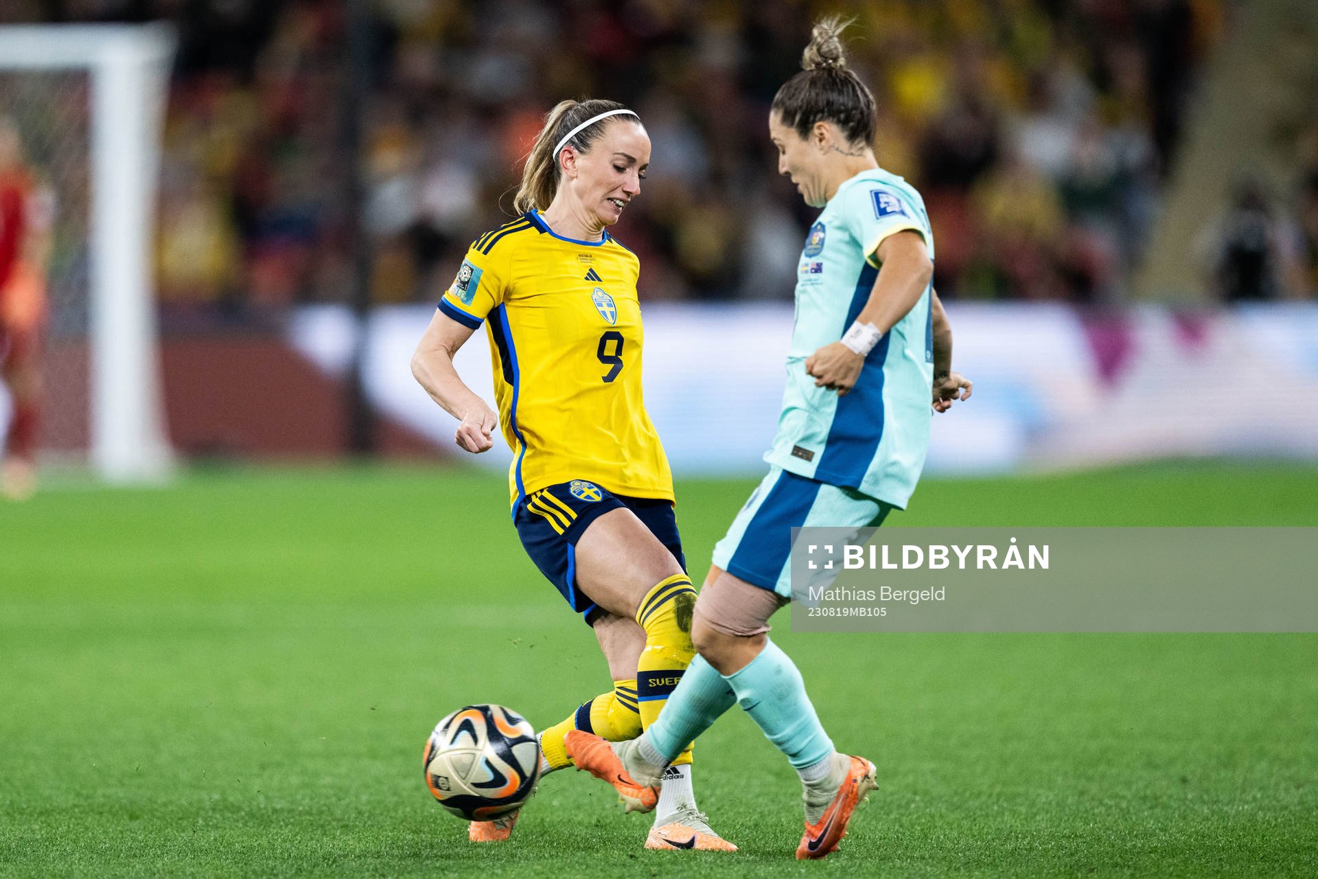 Kosovare Asllani of Sweden and Katrina Gorry of Australia