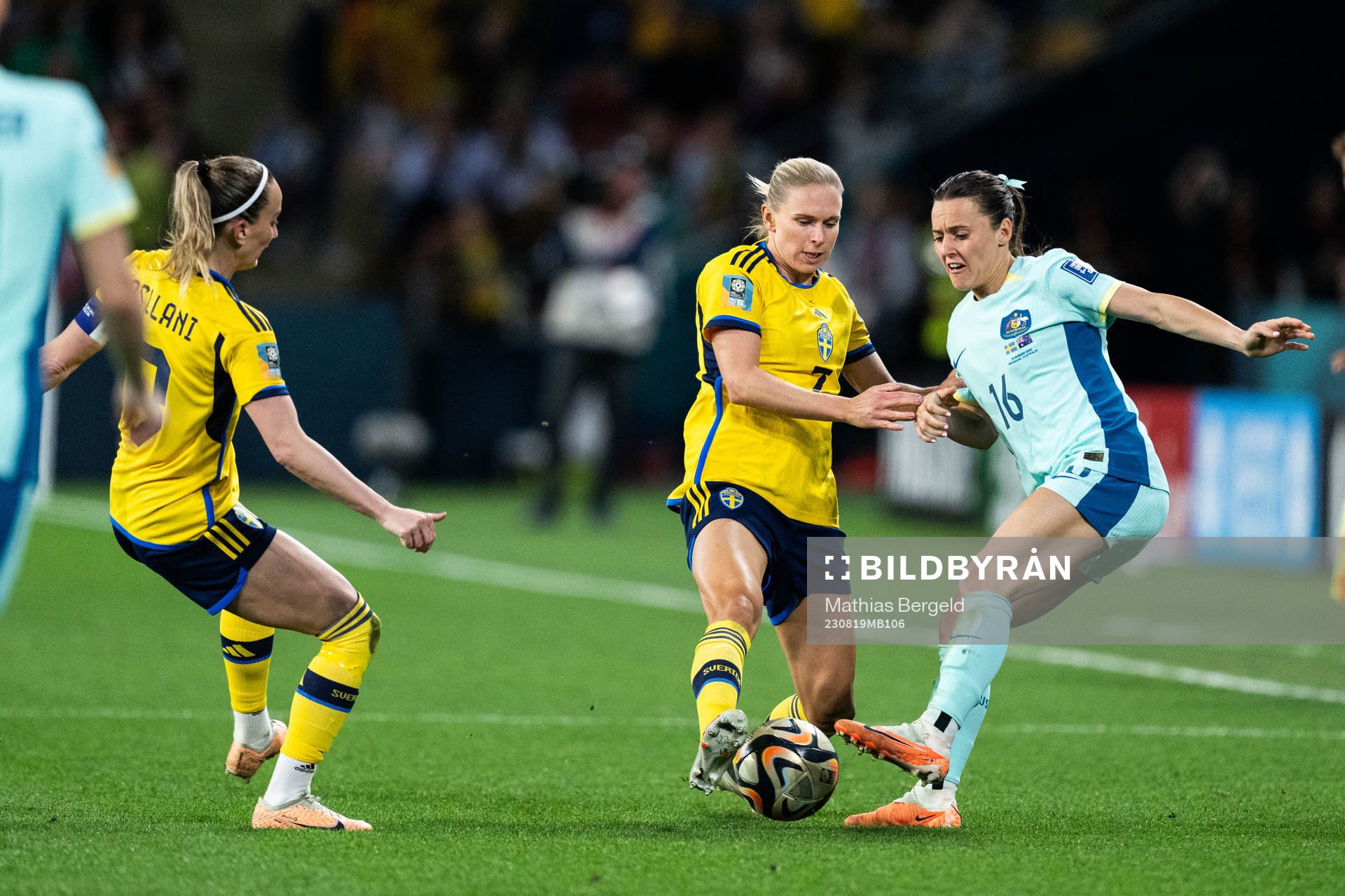 Hayley Raso of Australia against Kosovare Asllani and Jonna