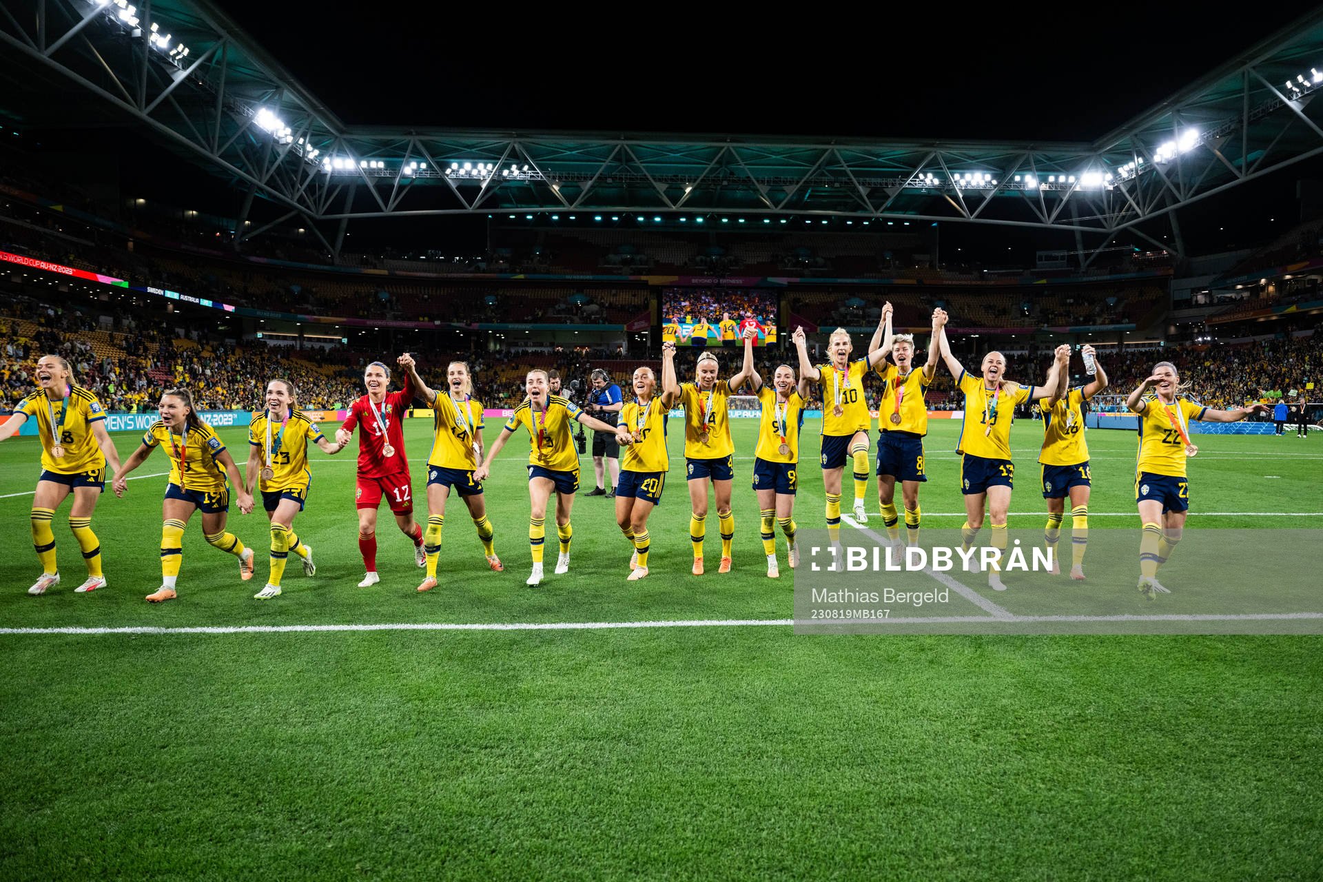 Players of Sweden celebrate with their bronze medals
