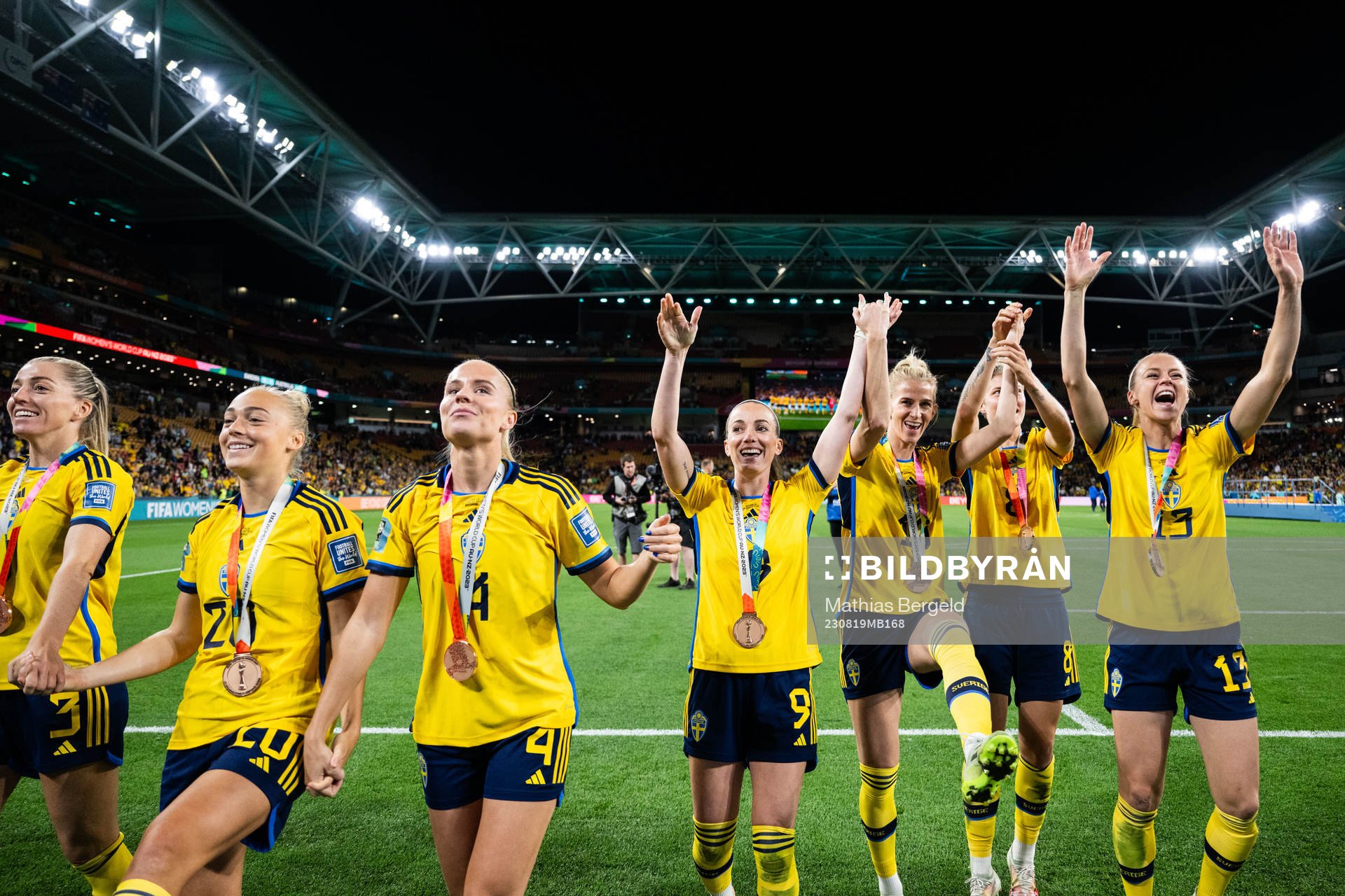 Players of Sweden celebrate with their bronze medals