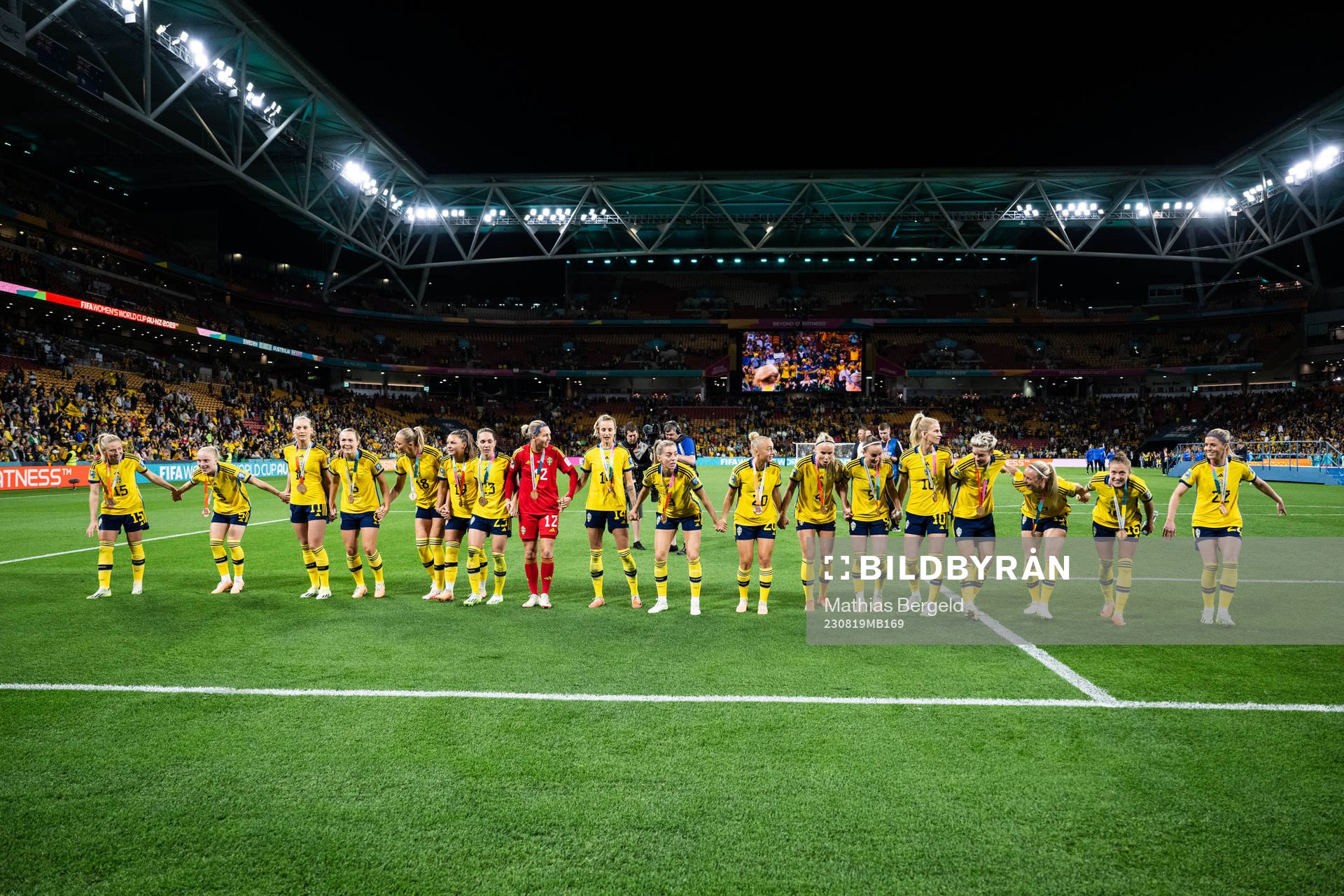 Players of Sweden celebrate with their bronze medals