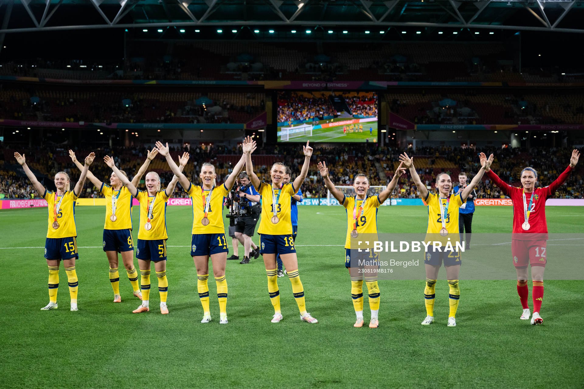 Rebecka Blomqvist, Magdalena Eriksson, Anna Sandberg, Stina Blackstenius, Fridolina Rolfö, Johanna Rytting Kaneryd and goalkeeper Jennifer Falk of Sweden celebrate with their bronze medals after the FIFA Women's World Cup bronze medal match between Sweden and Australia on August 19, 2023 in Brisbane.