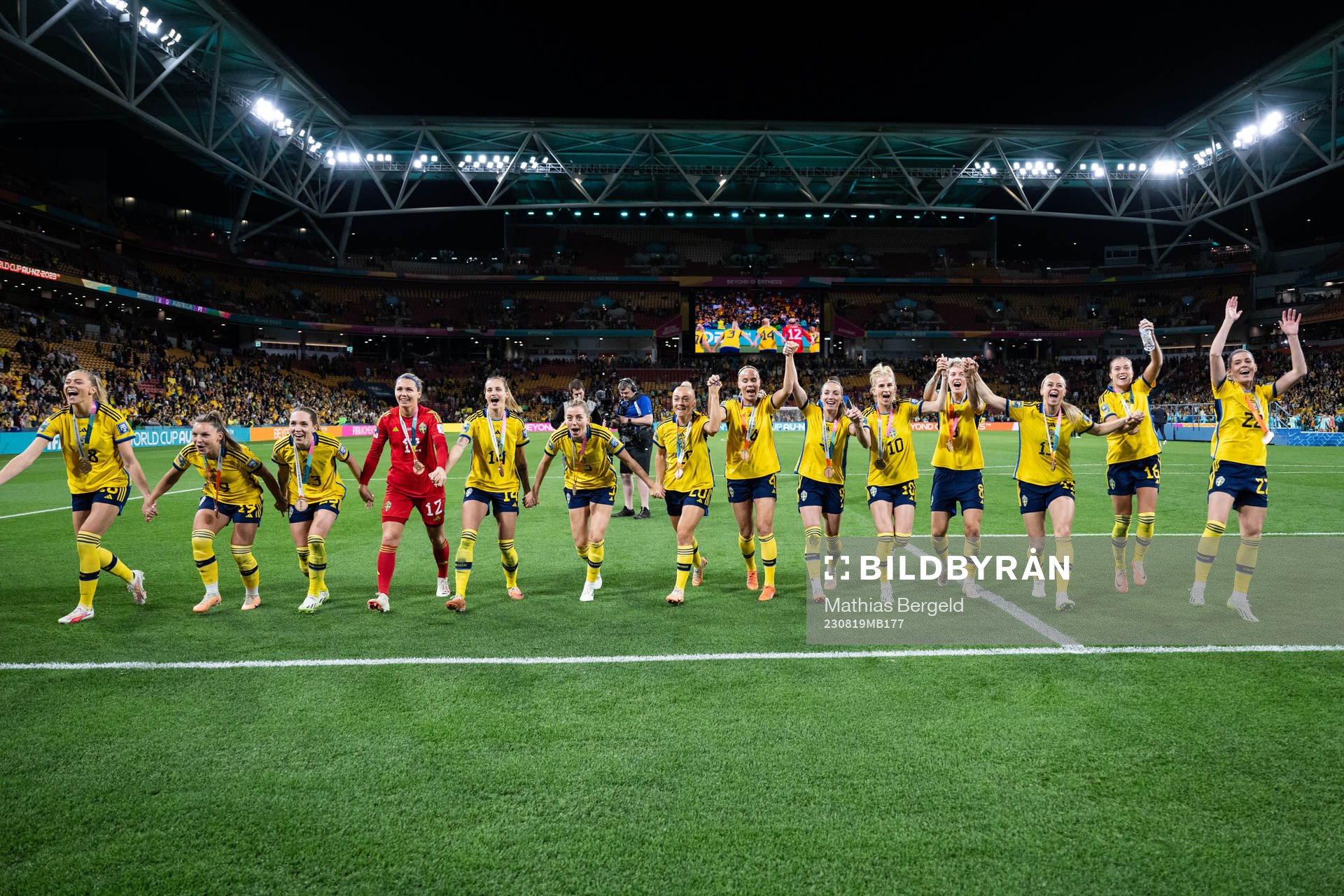 Players of Sweden celebrate with their bronze medals