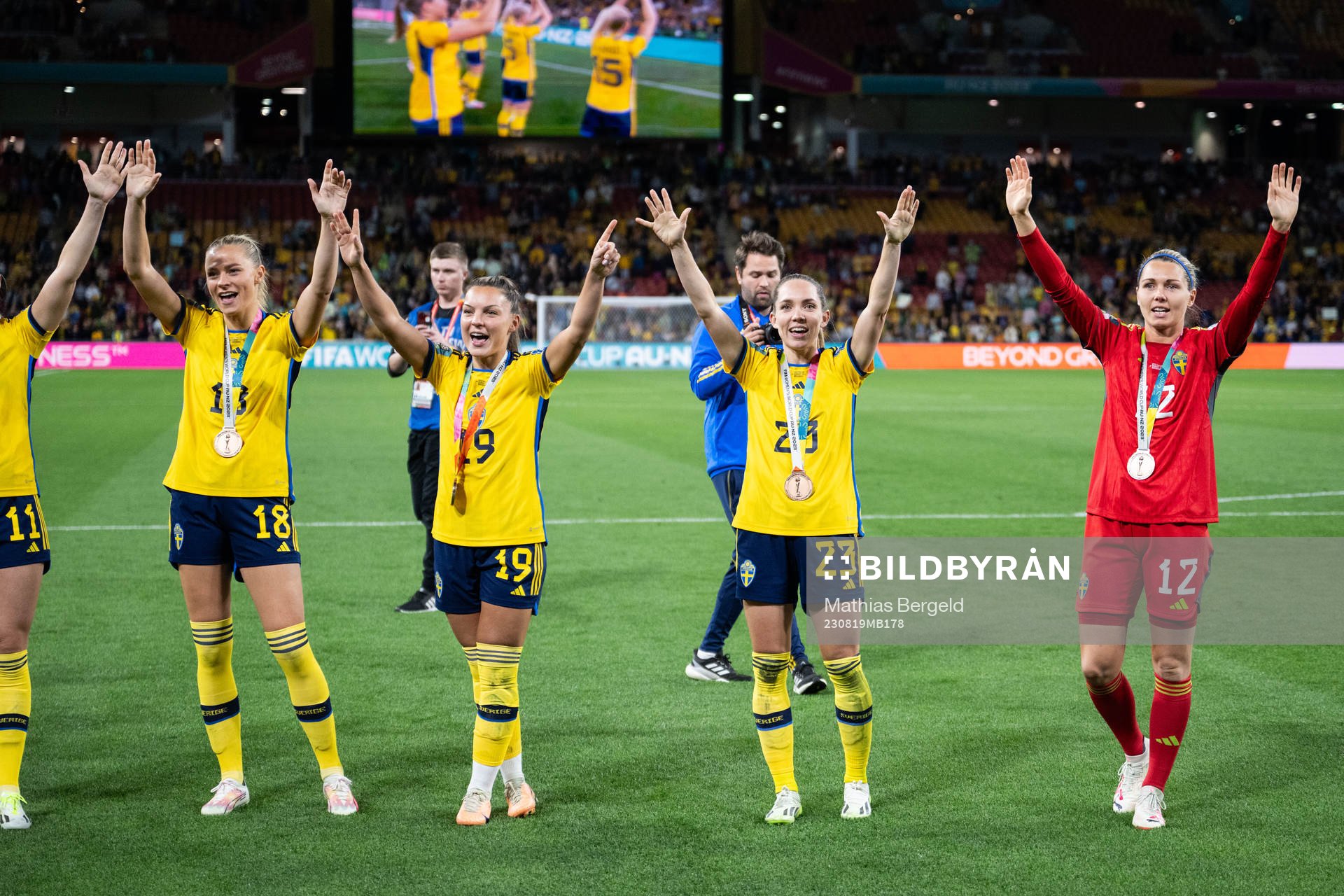 Fridolina Rolfö, Johanna Rytting Kaneryd, Elin Rubensson and goalkeeper Jennifer Falk of Sweden celebrate with their bronze medals after the FIFA Women's World Cup bronze medal match between Sweden and Australia on August 19, 2023 in Brisbane.