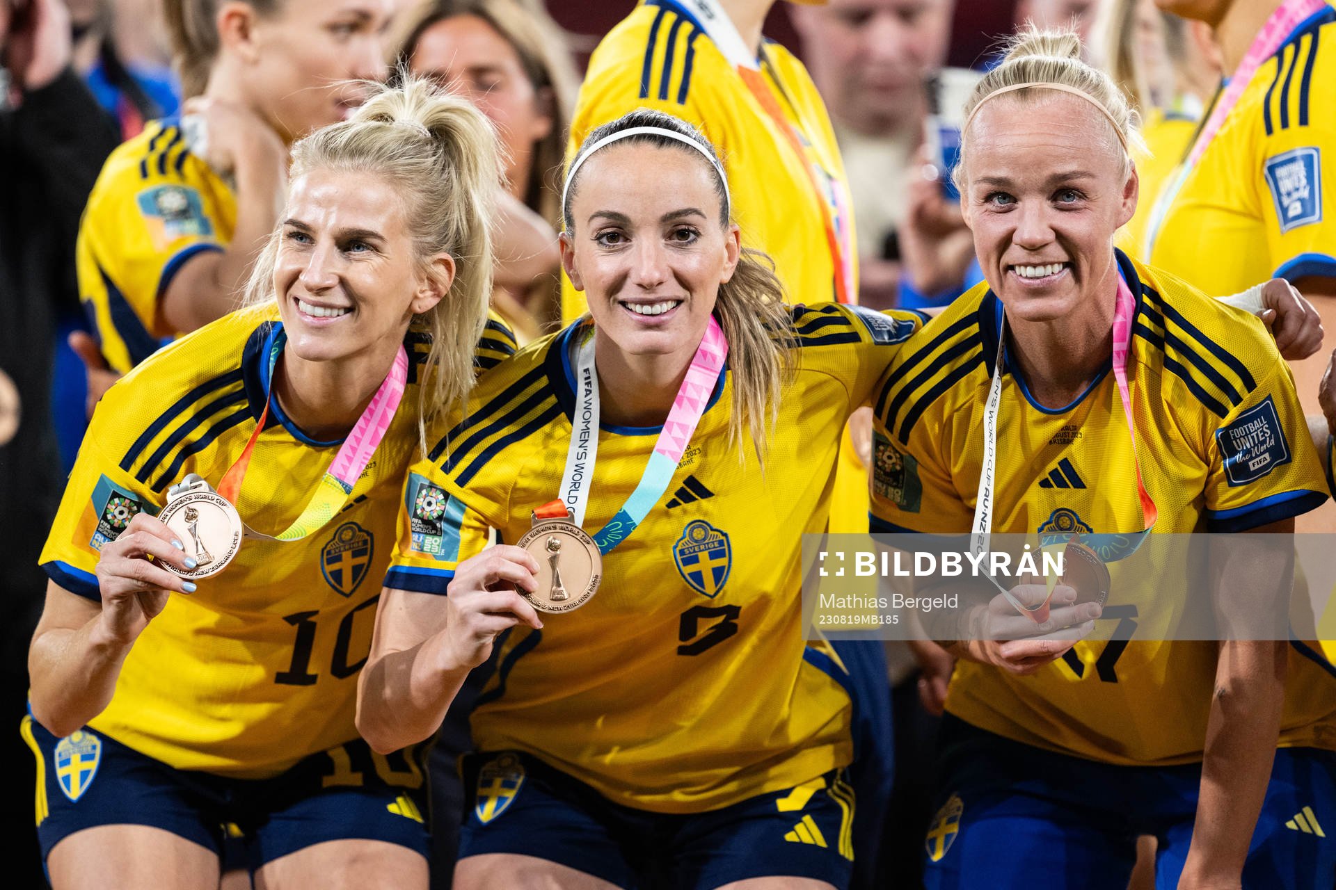 Sofia Jakobsson, Kosovare Asllani and Caroline Seger of Sweden celebrate with their bronze medals after the FIFA Women's World Cup bronze medal match between Sweden and Australia on August 19, 2023 in Brisbane.
