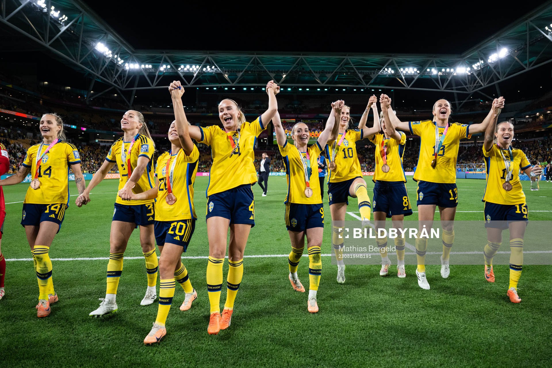 Players of Sweden celebrate with their bronze medals
