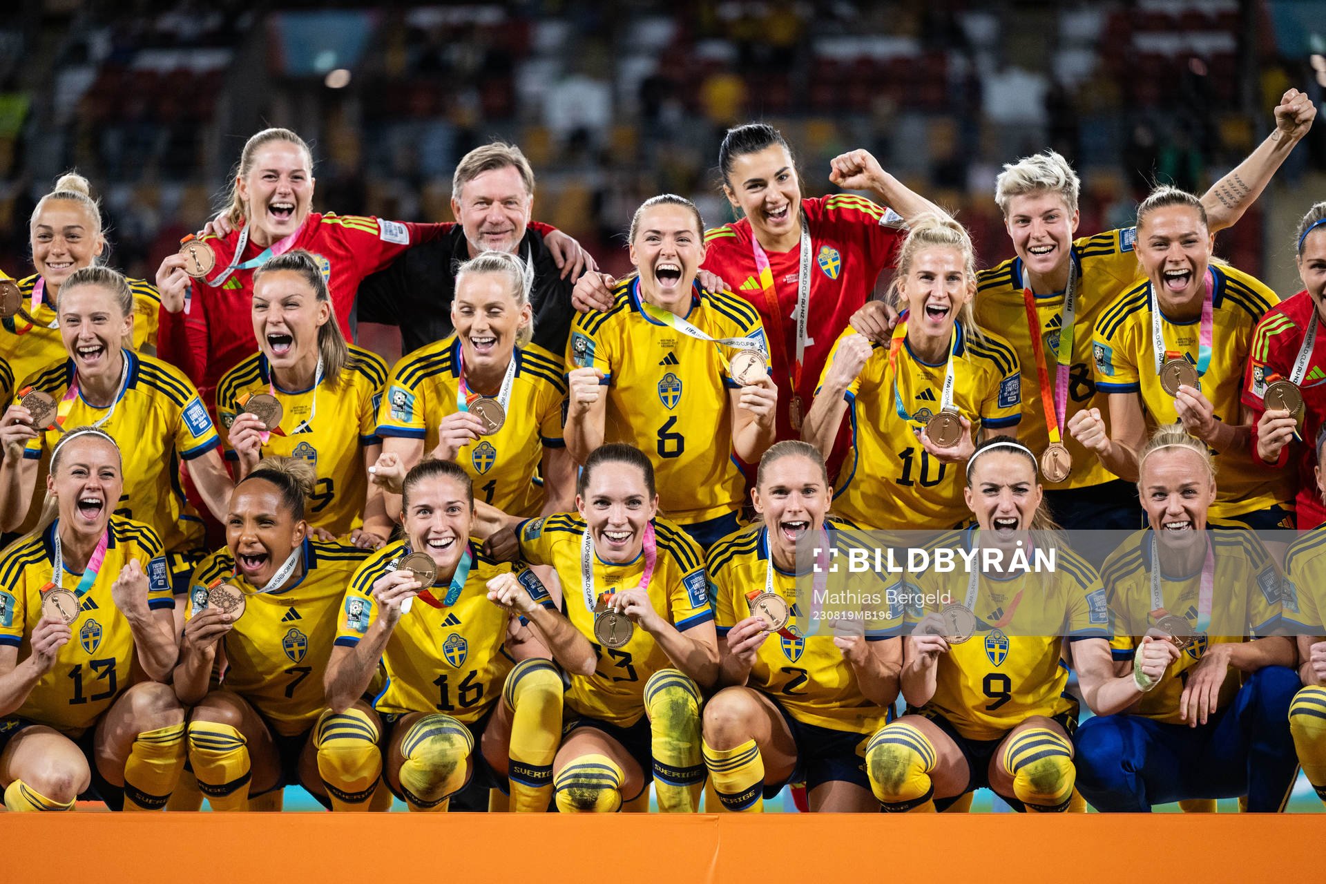 Players of Sweden celebrate with their bronze medals
