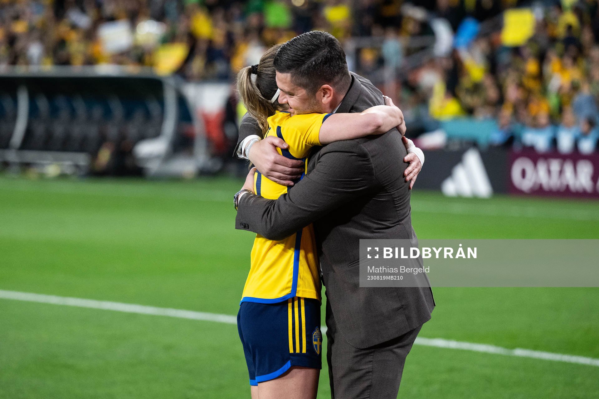 Kosovare Asllani of Sweden celebrates with TV-expert Bojan Djordjic after the FIFA Women's World Cup bronze medal match between Sweden and Australia on August 19, 2023 in Brisbane.