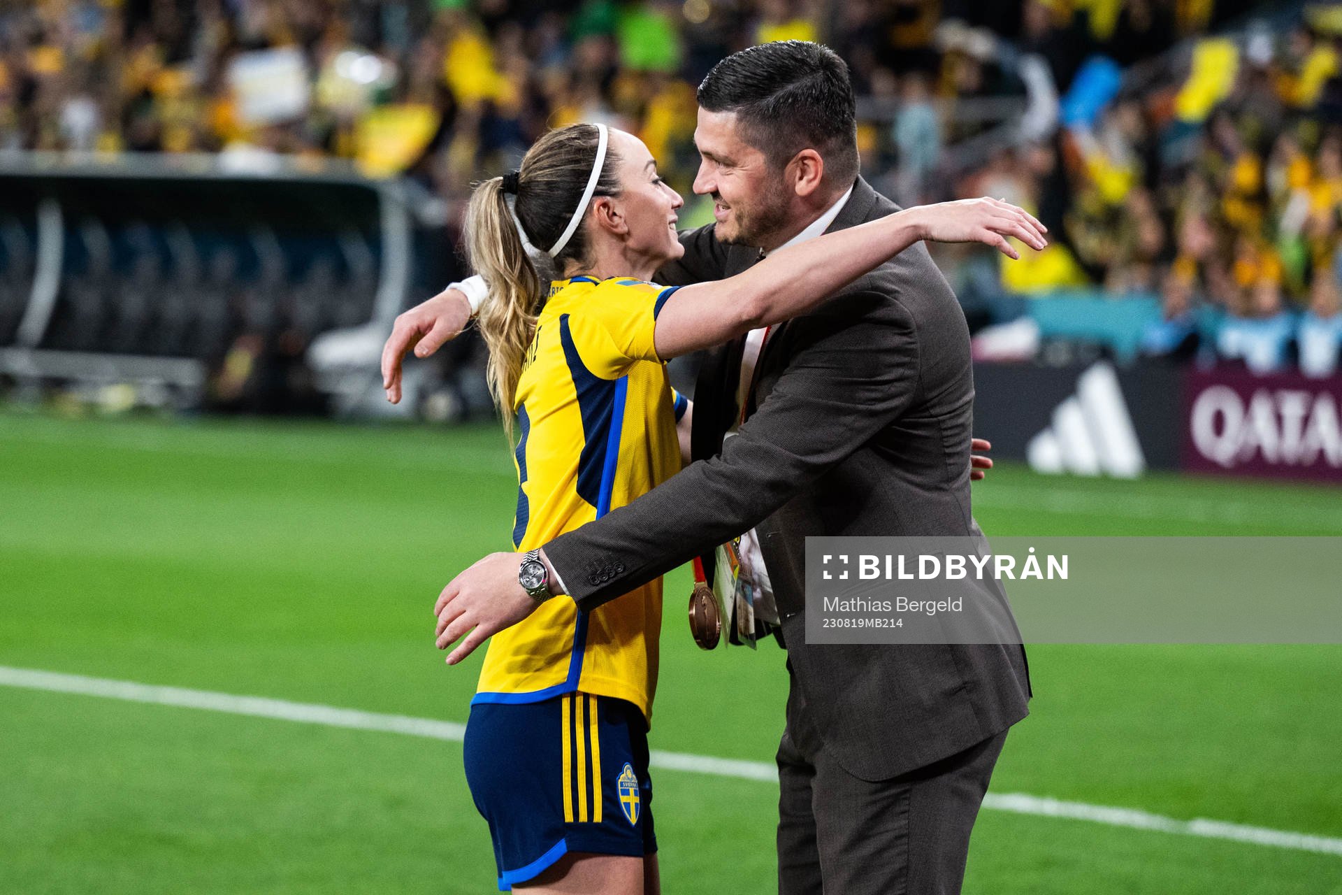 Kosovare Asllani of Sweden celebrates with TV-expert Bojan