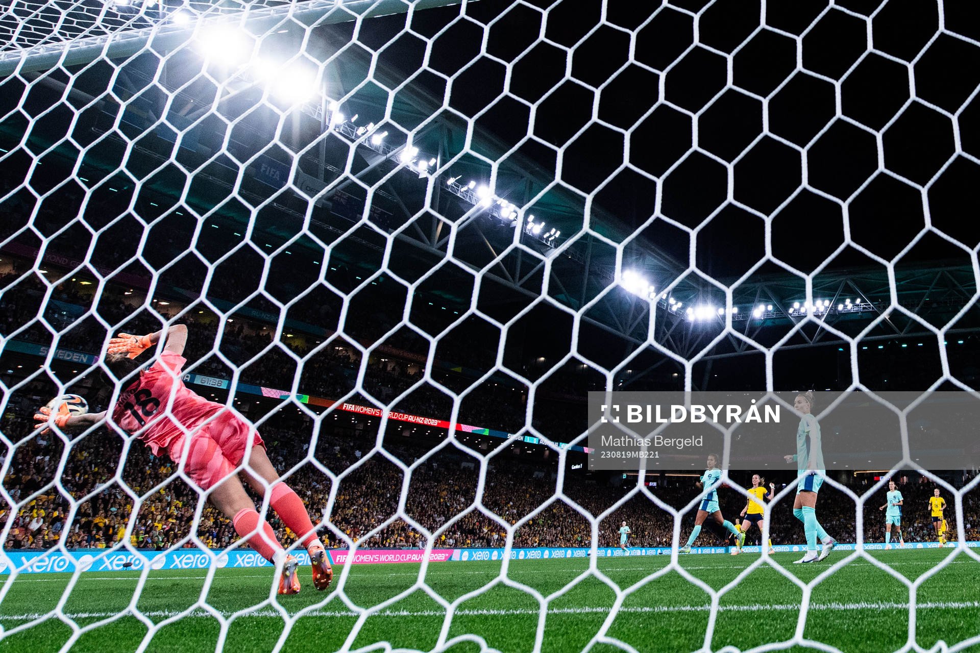 Kosovare Asllani of Sweden scores 2-0 behind goalkeeper