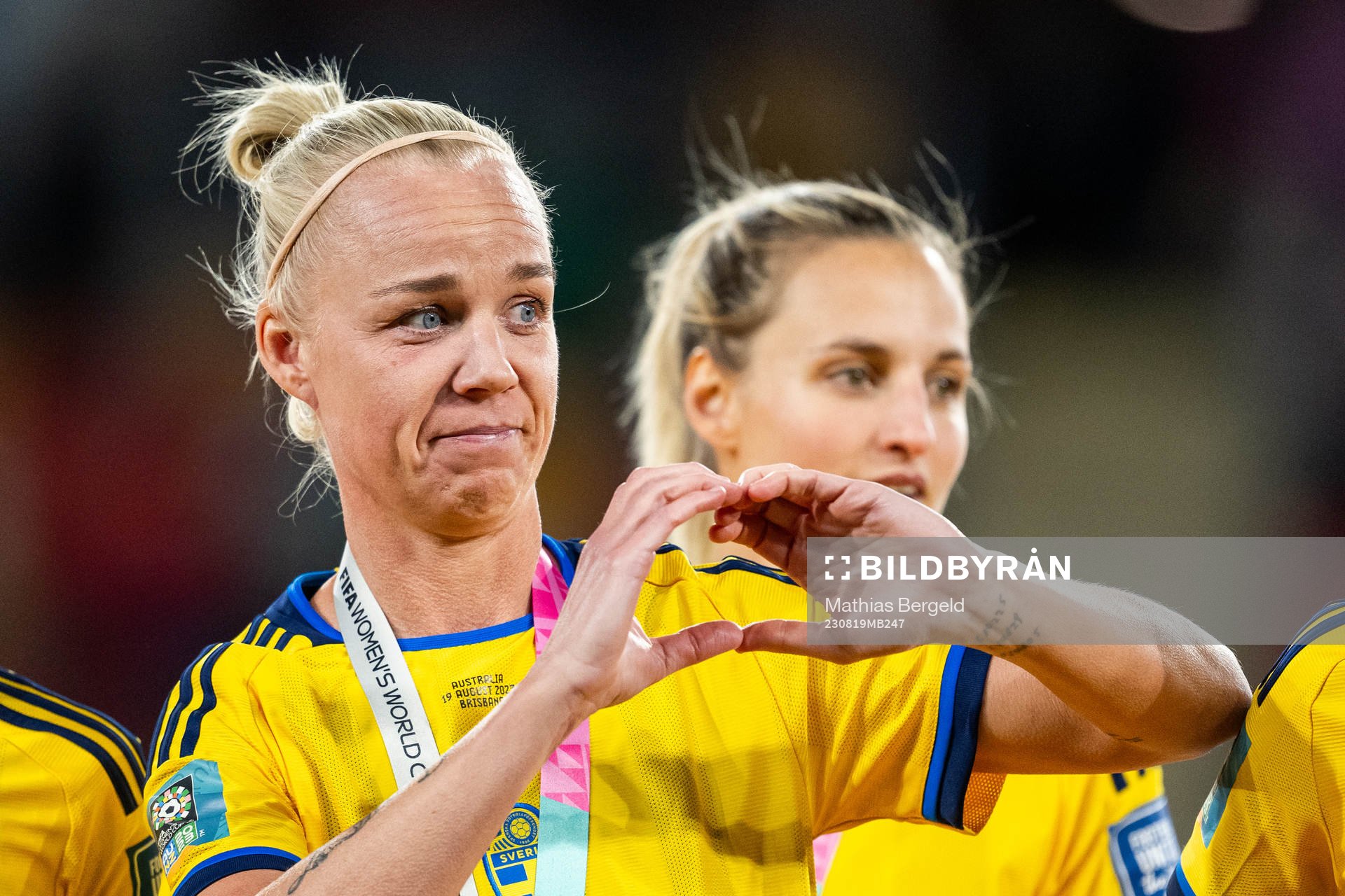Caroline Seger of Sweden forms a heart with her hands at