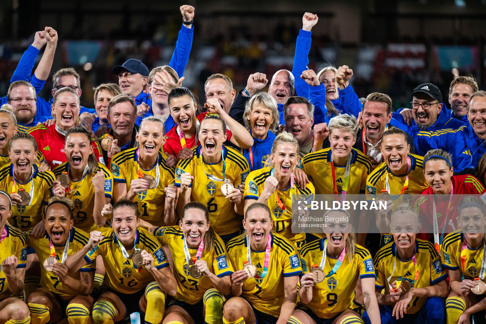 Players of Sweden celebrate with their medals