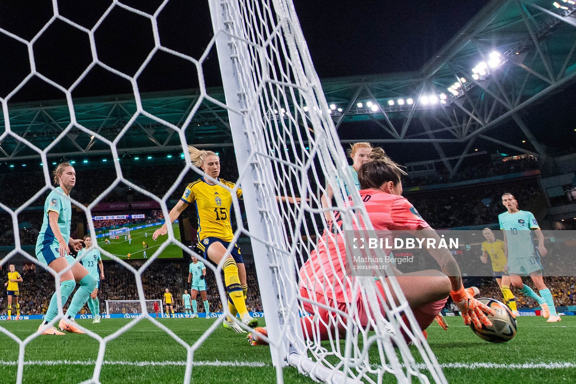 Rebecka Blomqvist of Sweden and goalkeeper Mackenzie Arnold
