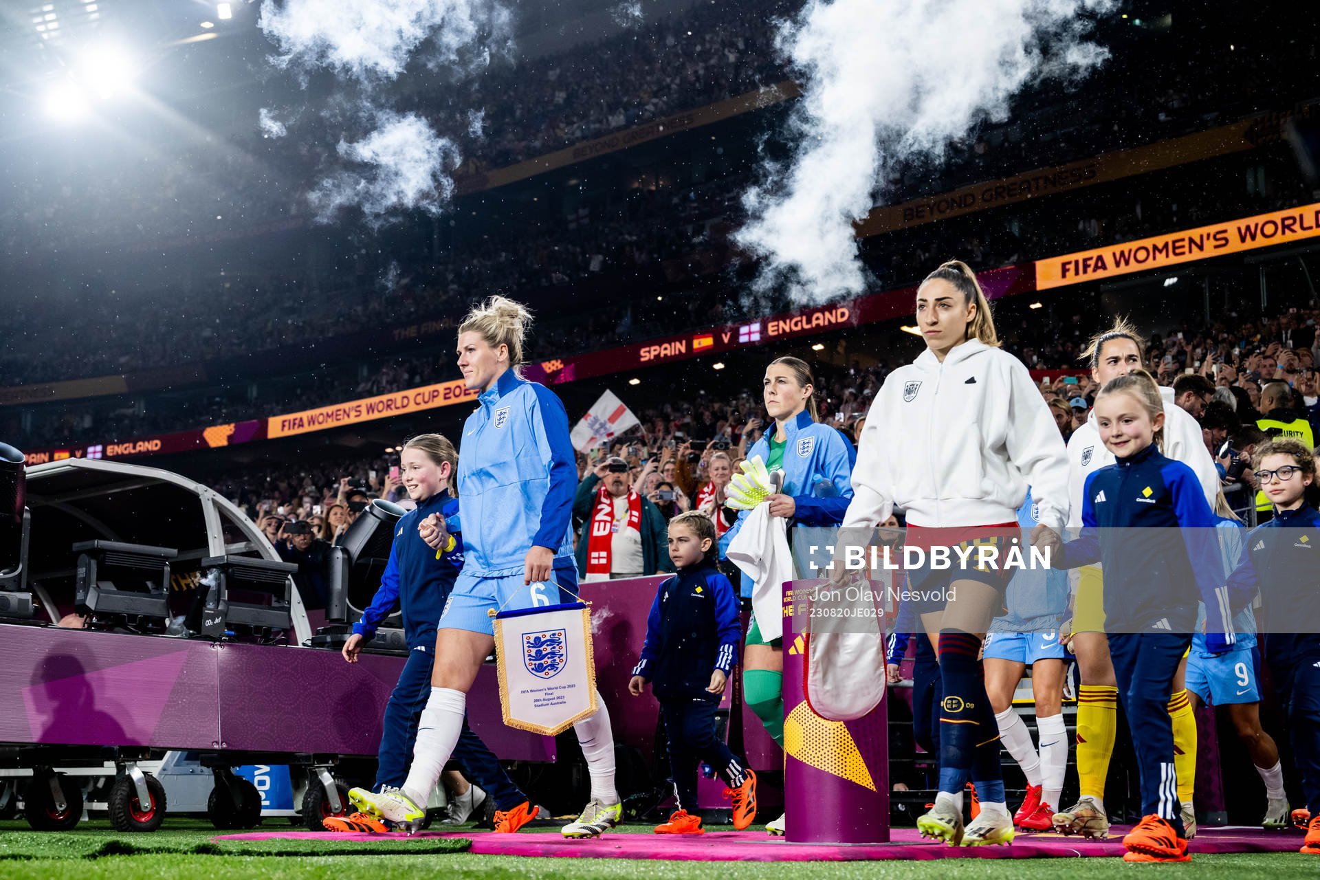 Millie Bright of England and Olga Carmona of Spain enters