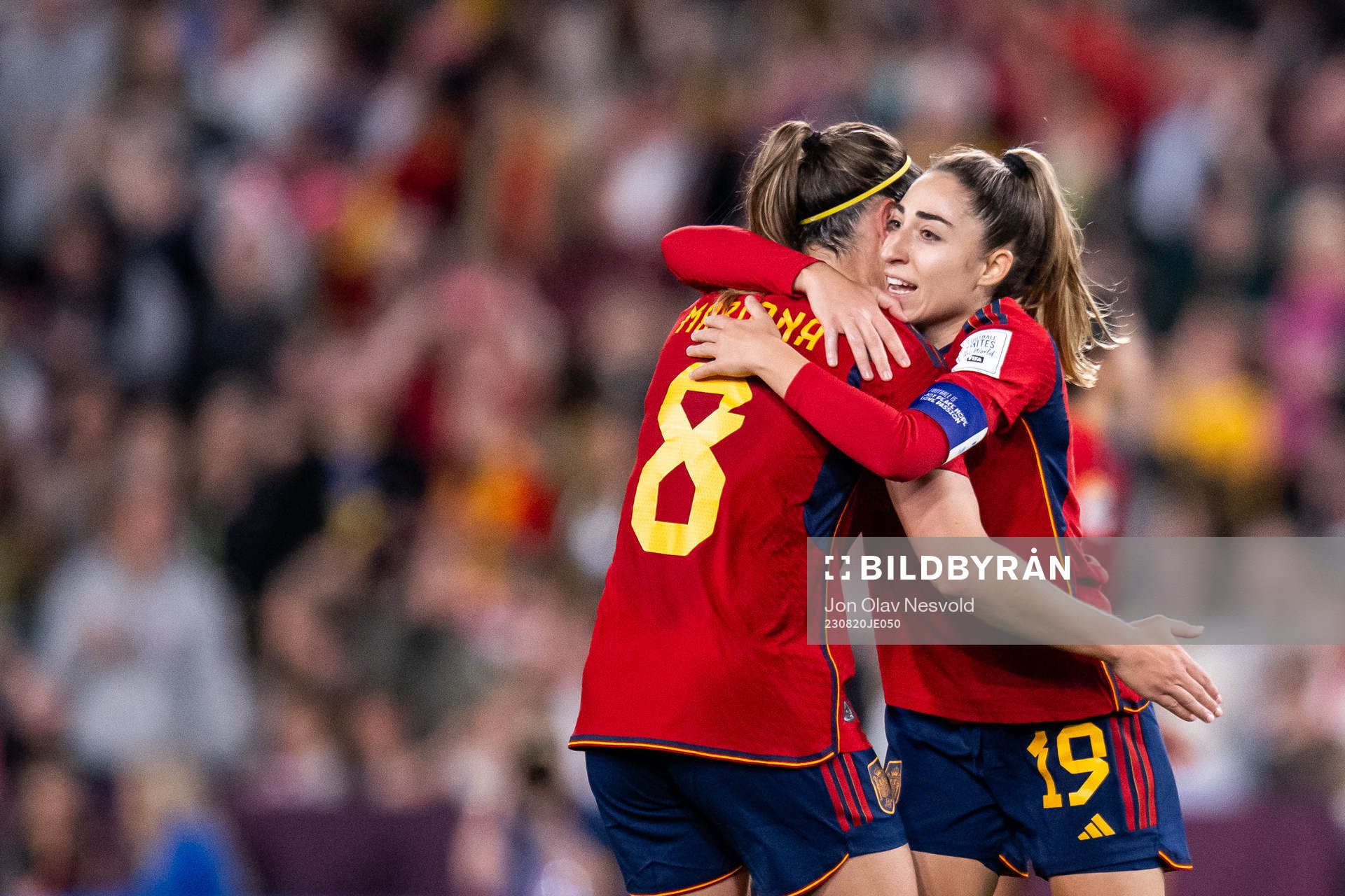 Mariona Caldentey and Olga Carmona of Spain celebrate