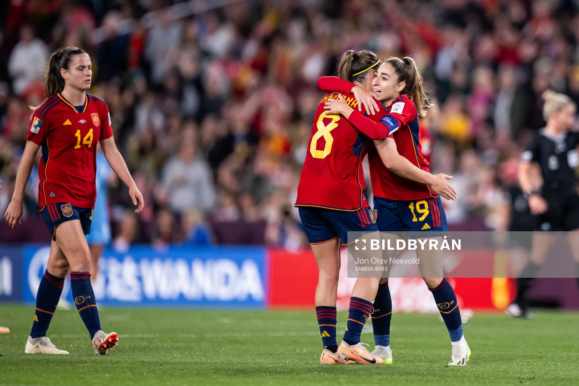 Mariona Caldentey and Olga Carmona of Spain celebrate