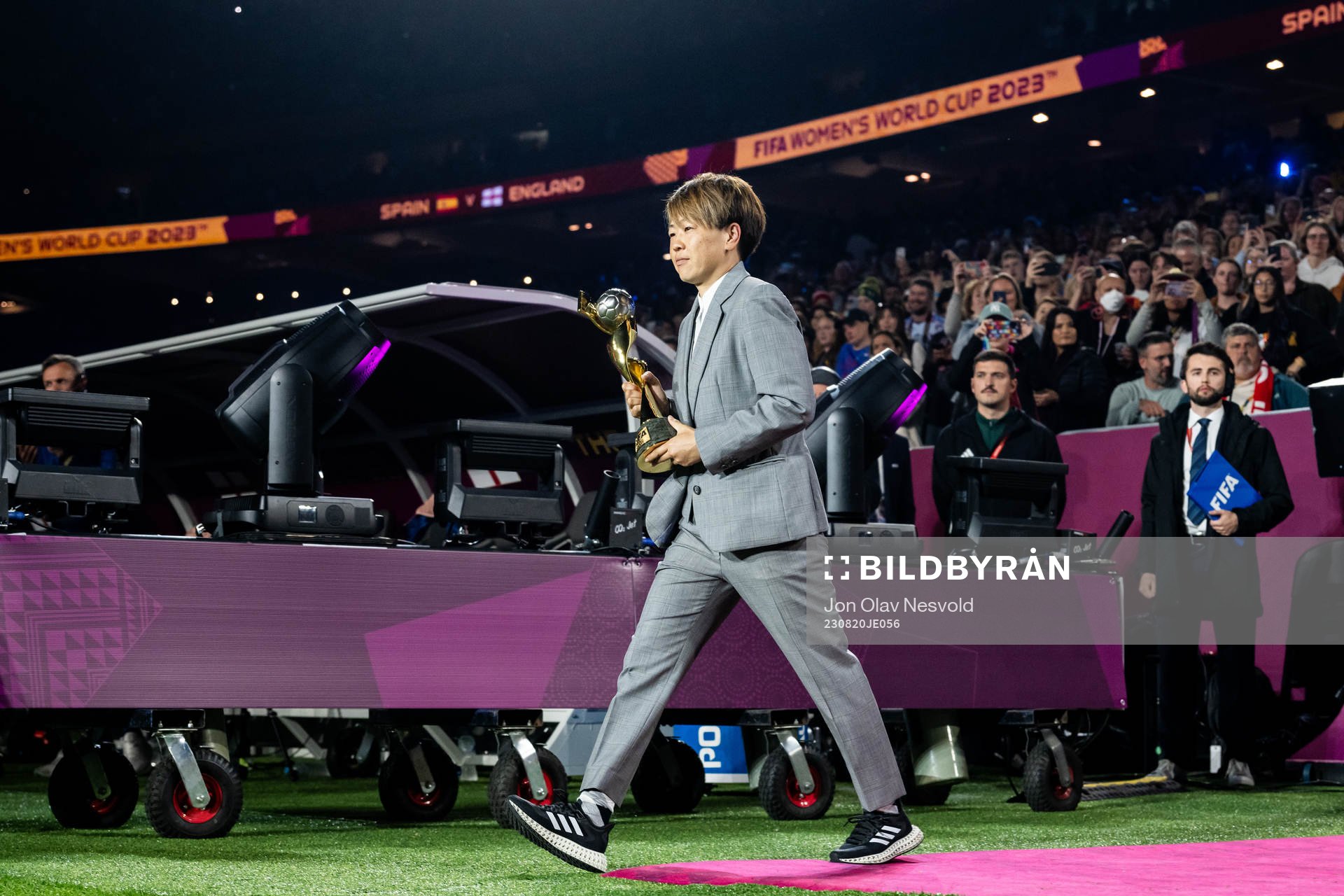 Aya Miyama with the World Cup trophy