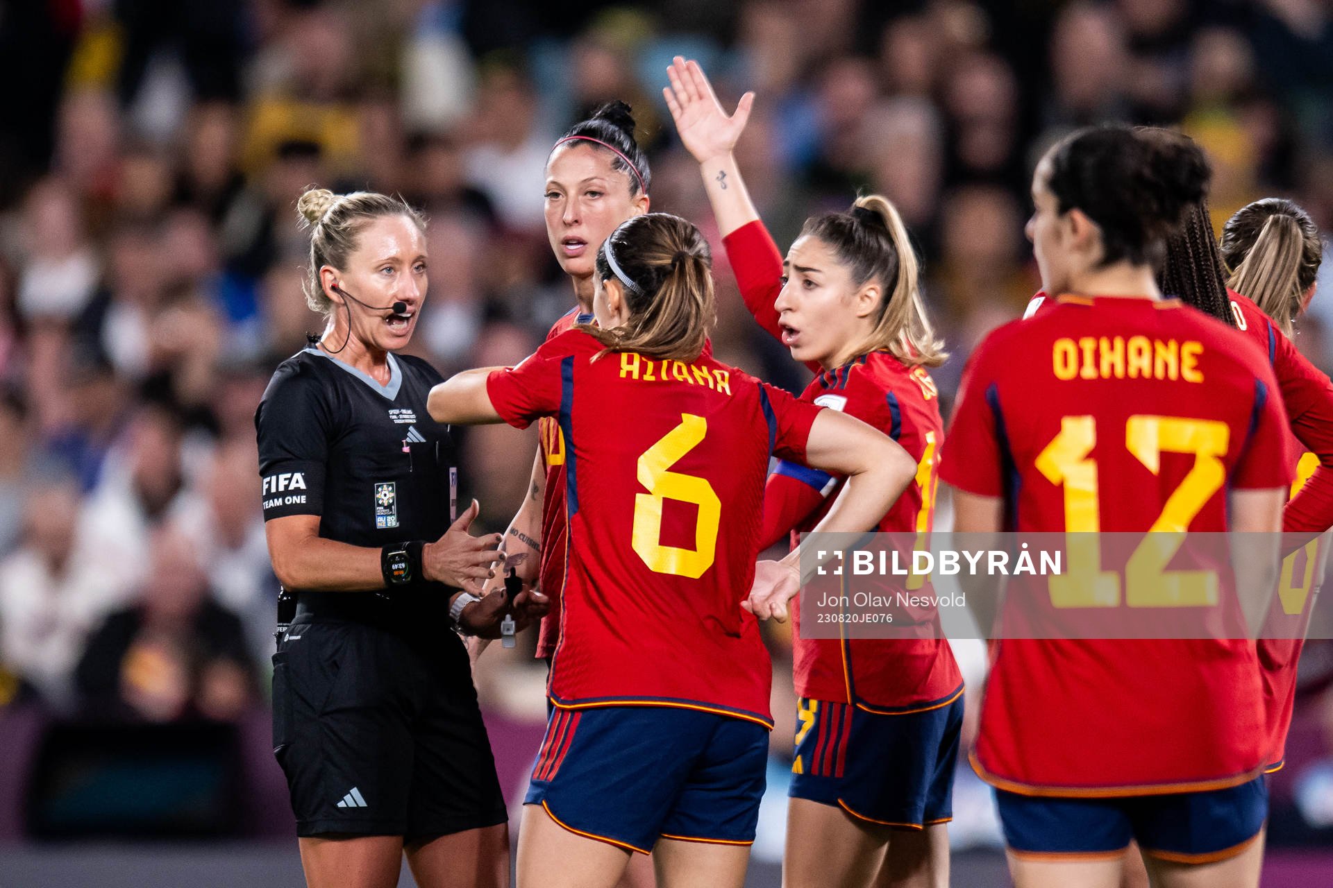 Players of Spain reacts against referee Tori Penso