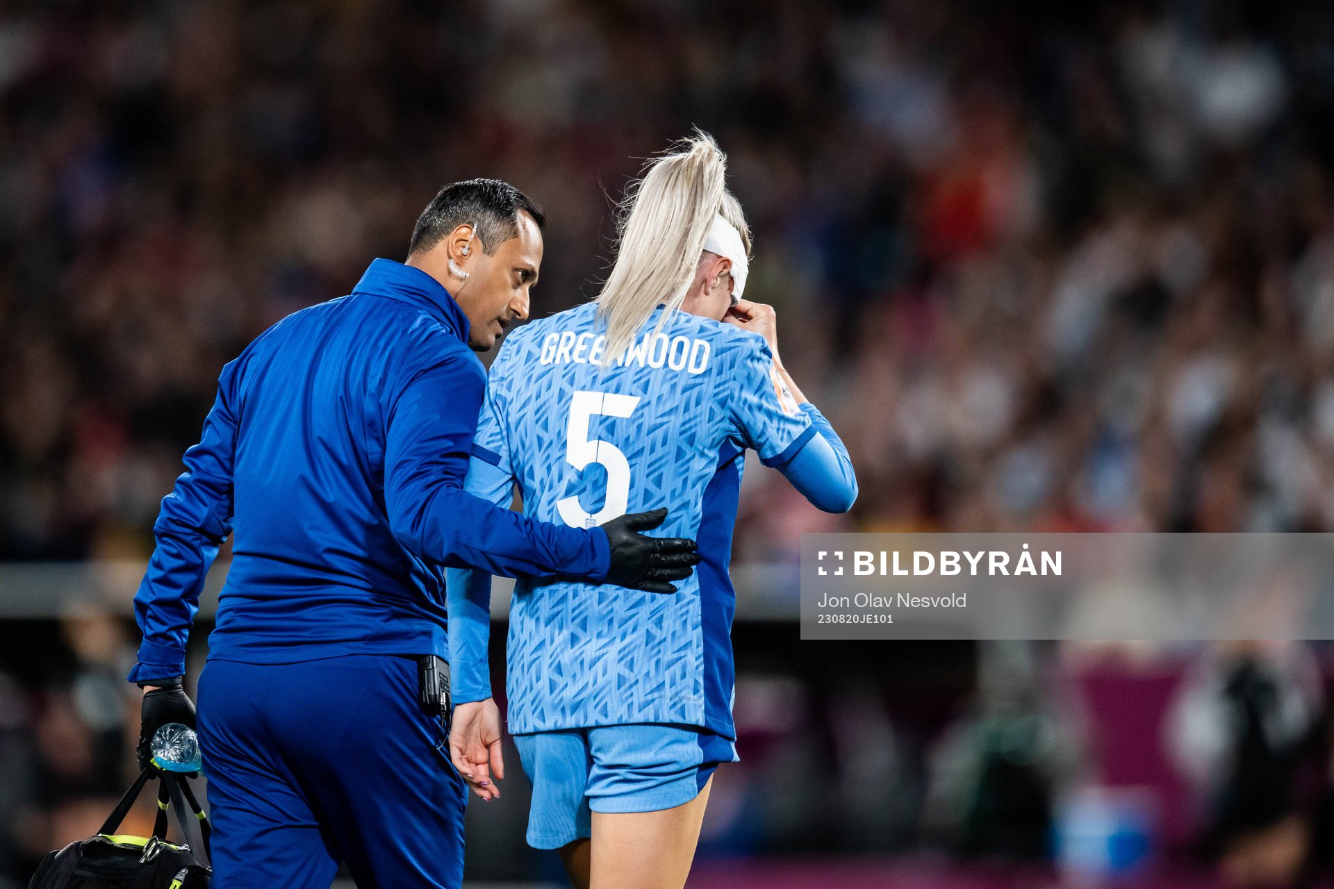 Alex Greenwood of England receives medical attention