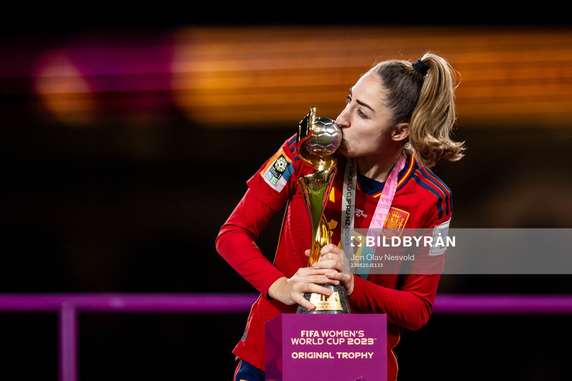 Olga Carmona of Spain celebrates with the trophy