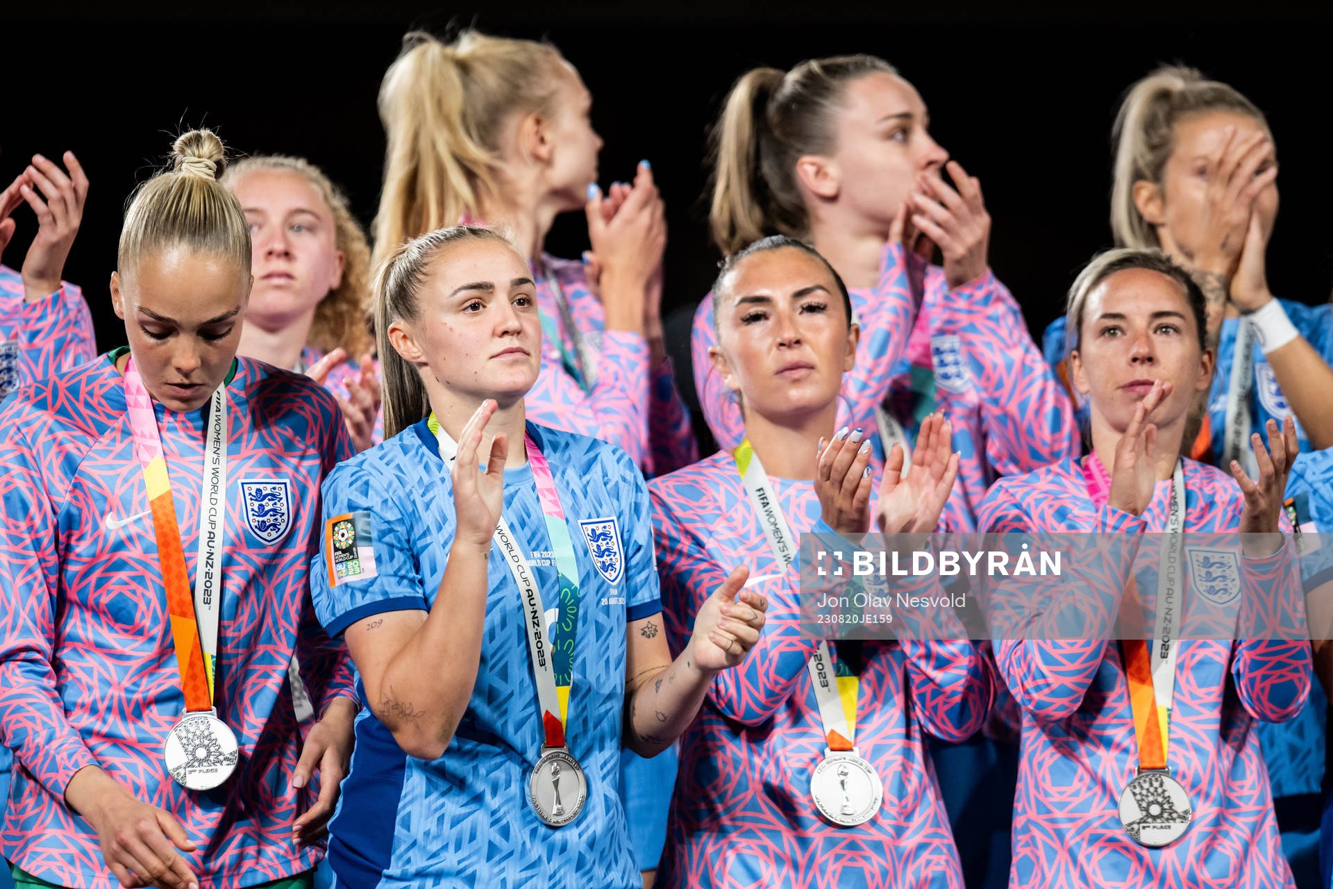 Players of England with their silver medals