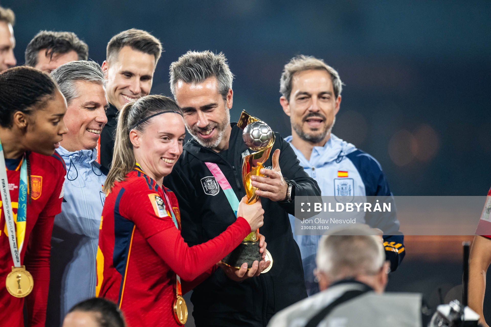 Maria Perez and Head coach Jorge Vilda of Spain celebrate