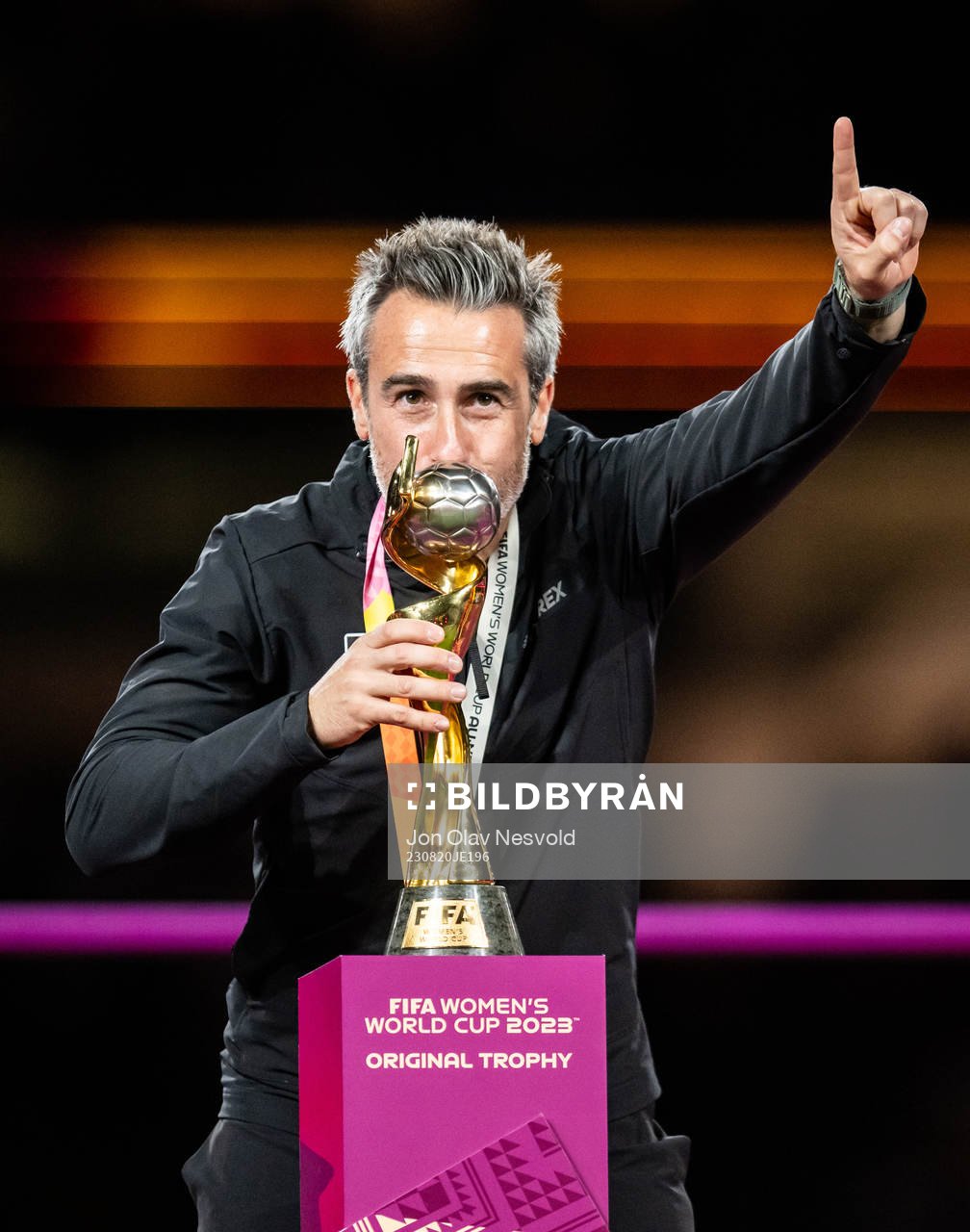 Head coach Jorge Vilda of Spain celebrates with the trophy