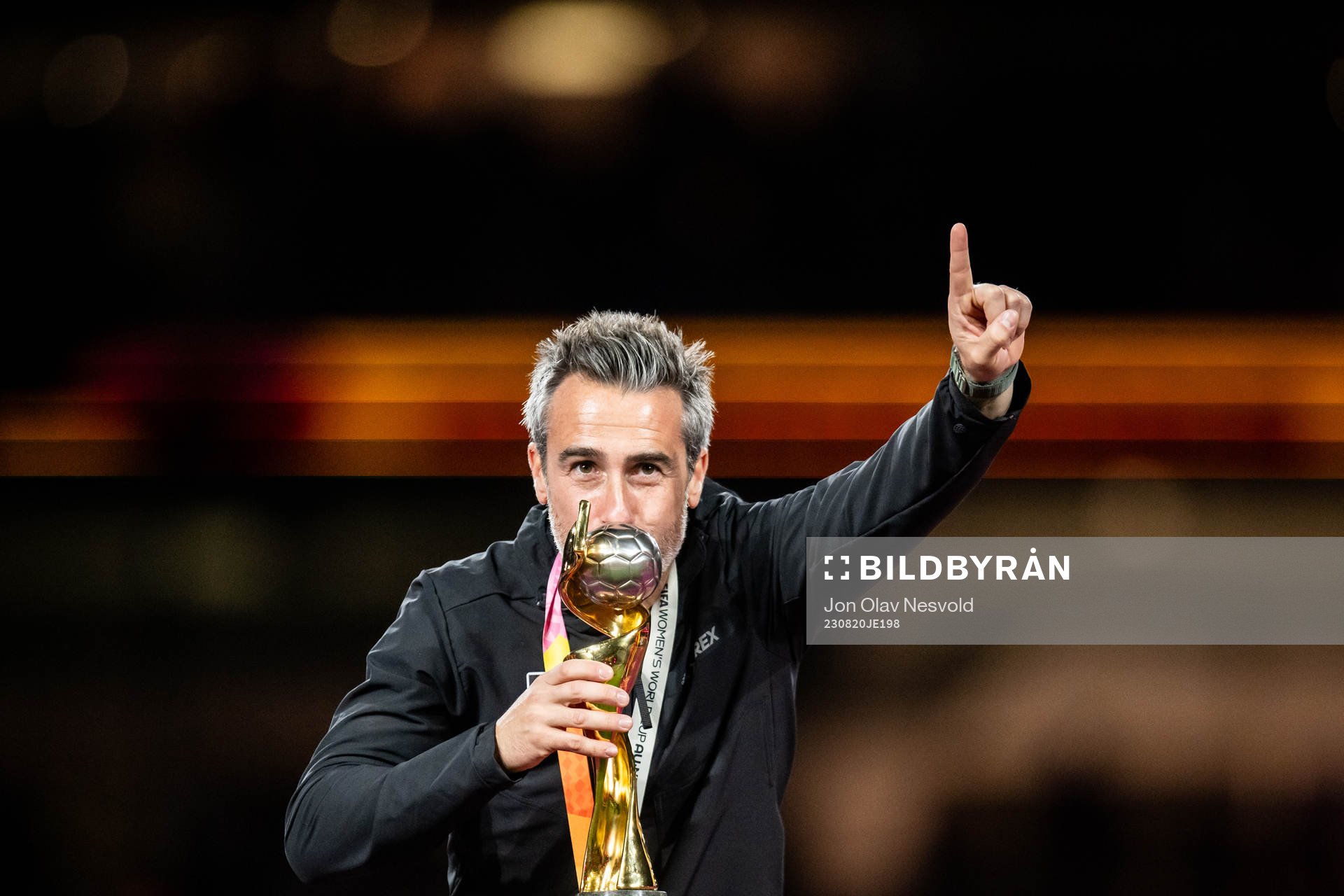 Head coach Jorge Vilda of Spain celebrates with the trophy