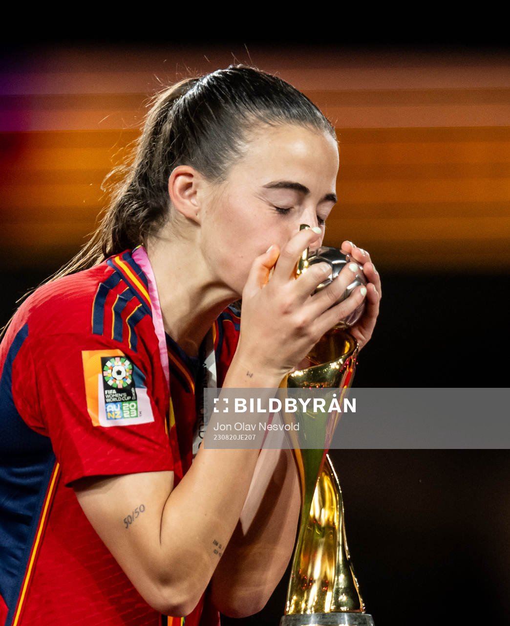 Maria Perez of Spain celebrates with the trophy