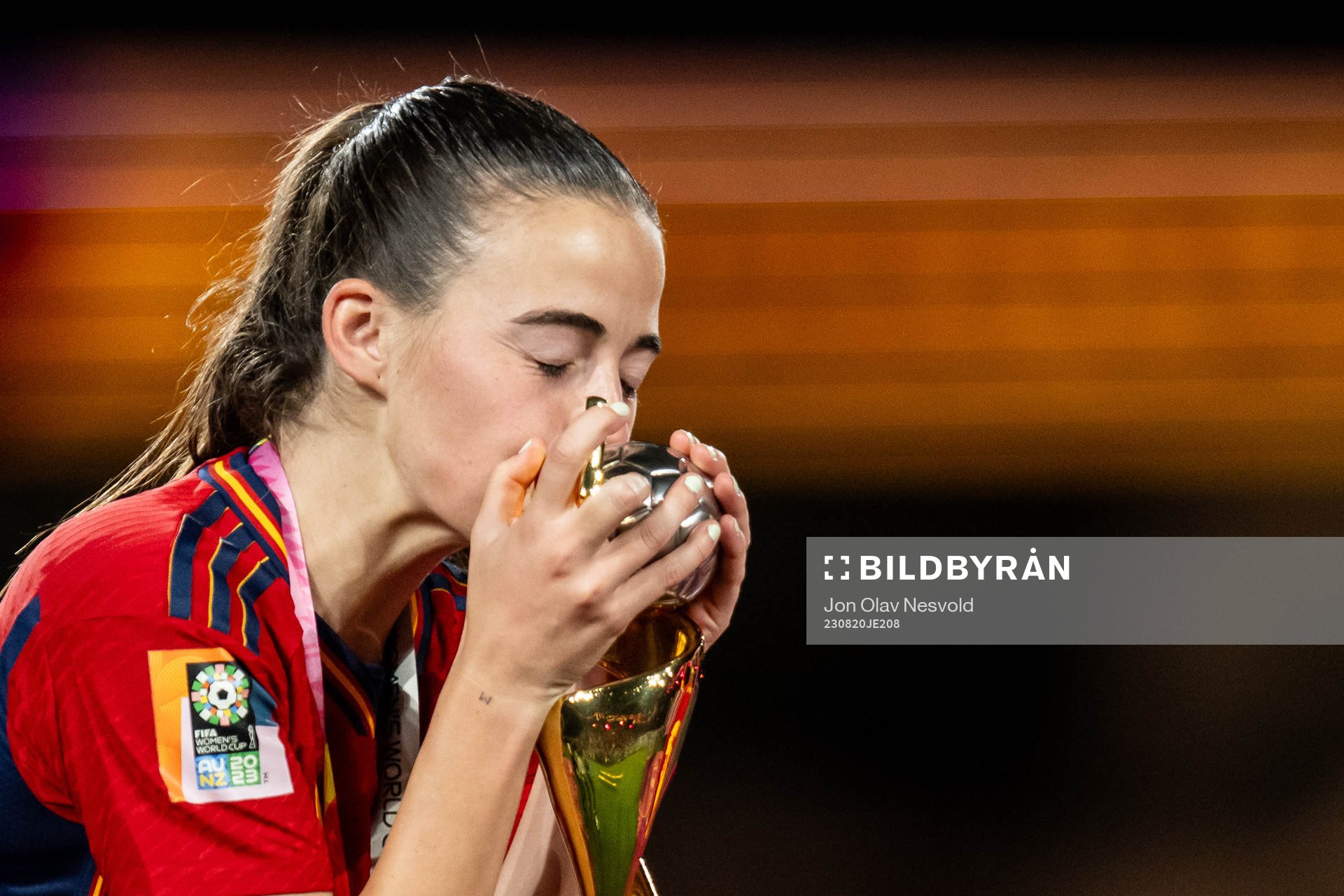 Maria Perez of Spain celebrates with the trophy