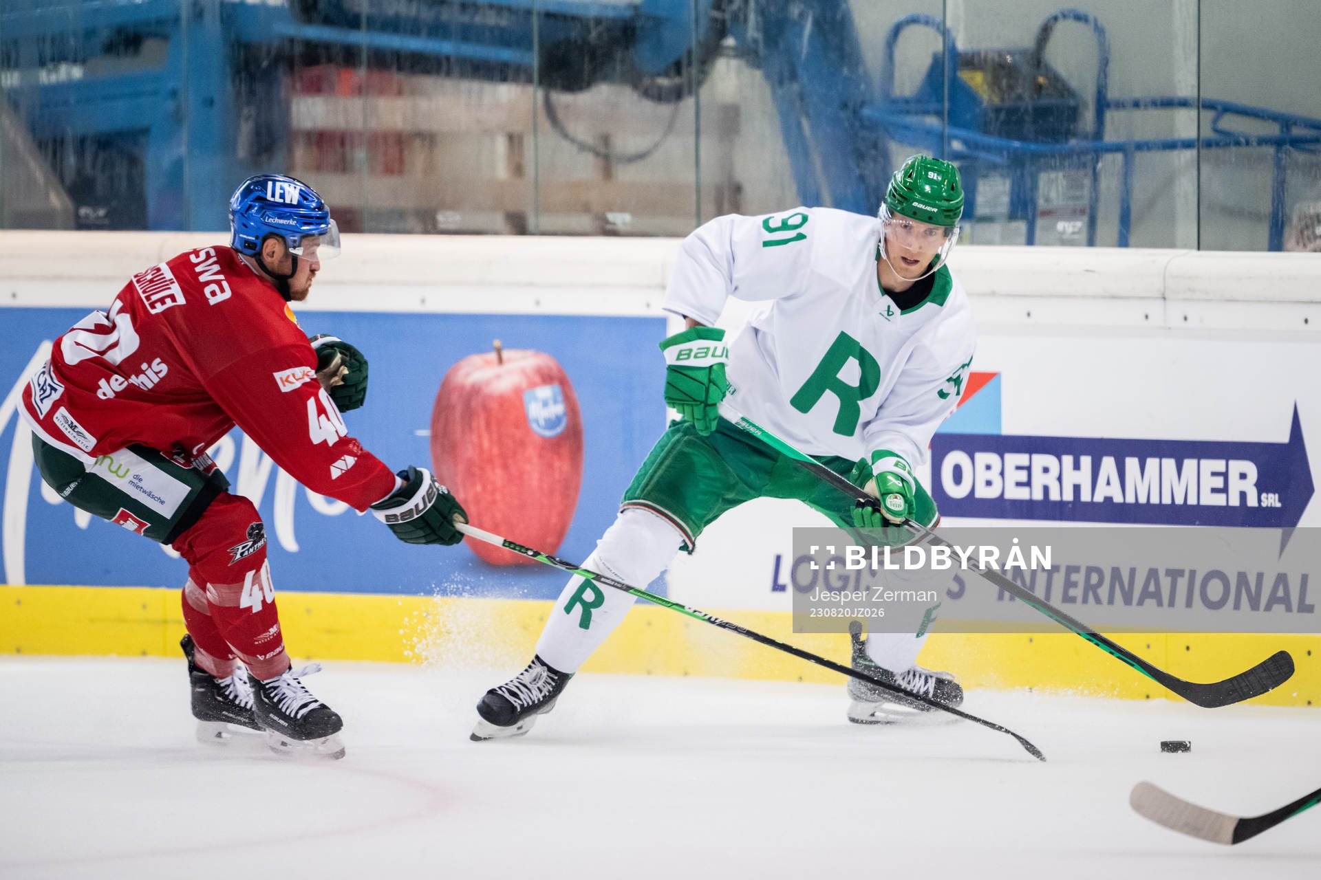 Tim Schule of Augsburger Panther and Adam Tambellini of