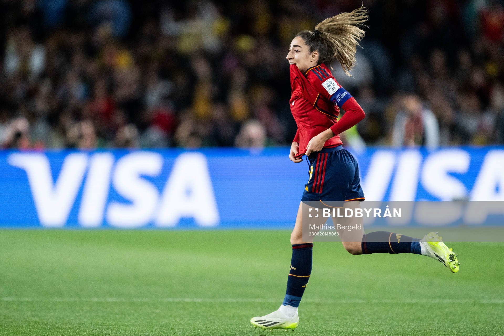 Olga Carmona of Spain celebrates